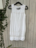 Old Navy white sleeveless mini dress front view simple elegant silhouette thrifted dresses Sassy and Chic