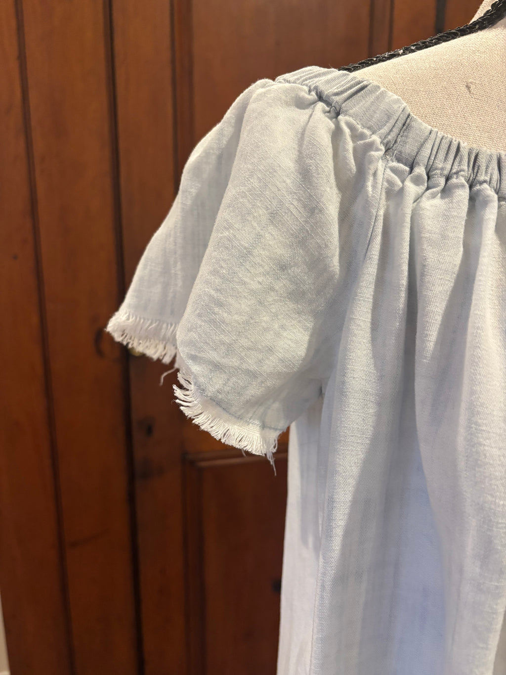 Cloth Stone light blue off shoulder dress detail close up soft blue hue flirty neckline Sassy and Chic
