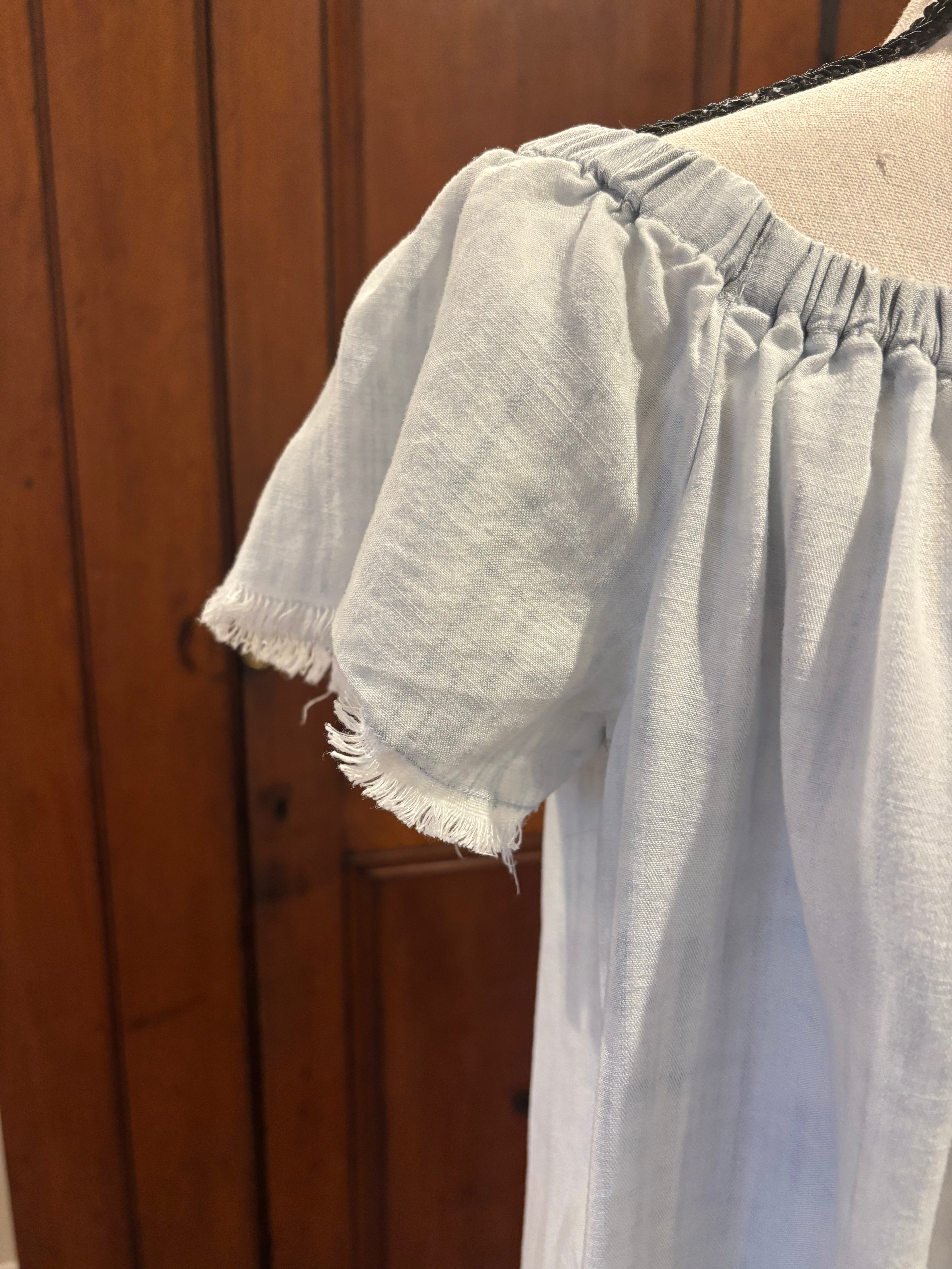 Cloth Stone light blue off shoulder dress detail close up soft blue hue flirty neckline Sassy and Chic