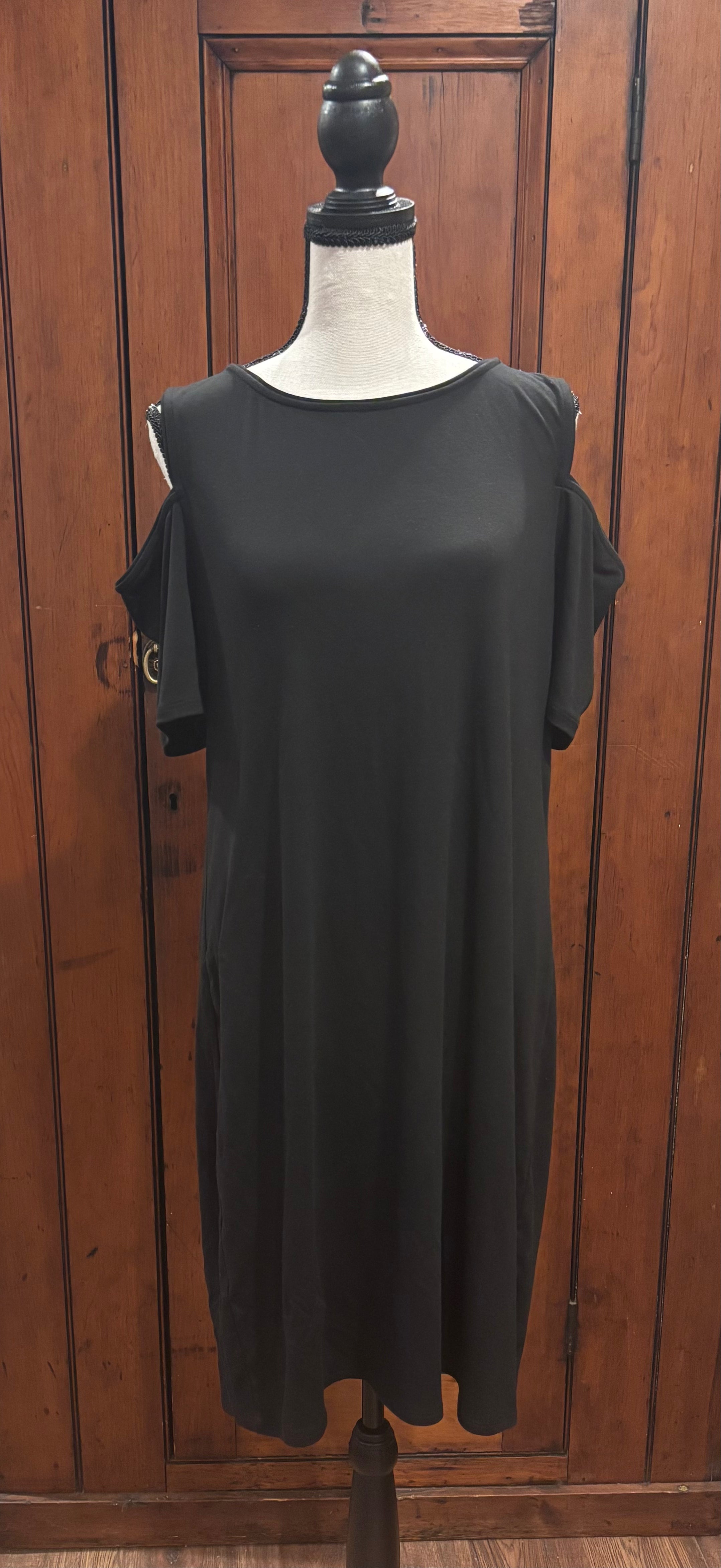 WHBM black midi dress front view round neckline playful peekaboo sleeves thrifted dresses Sassy and Chic