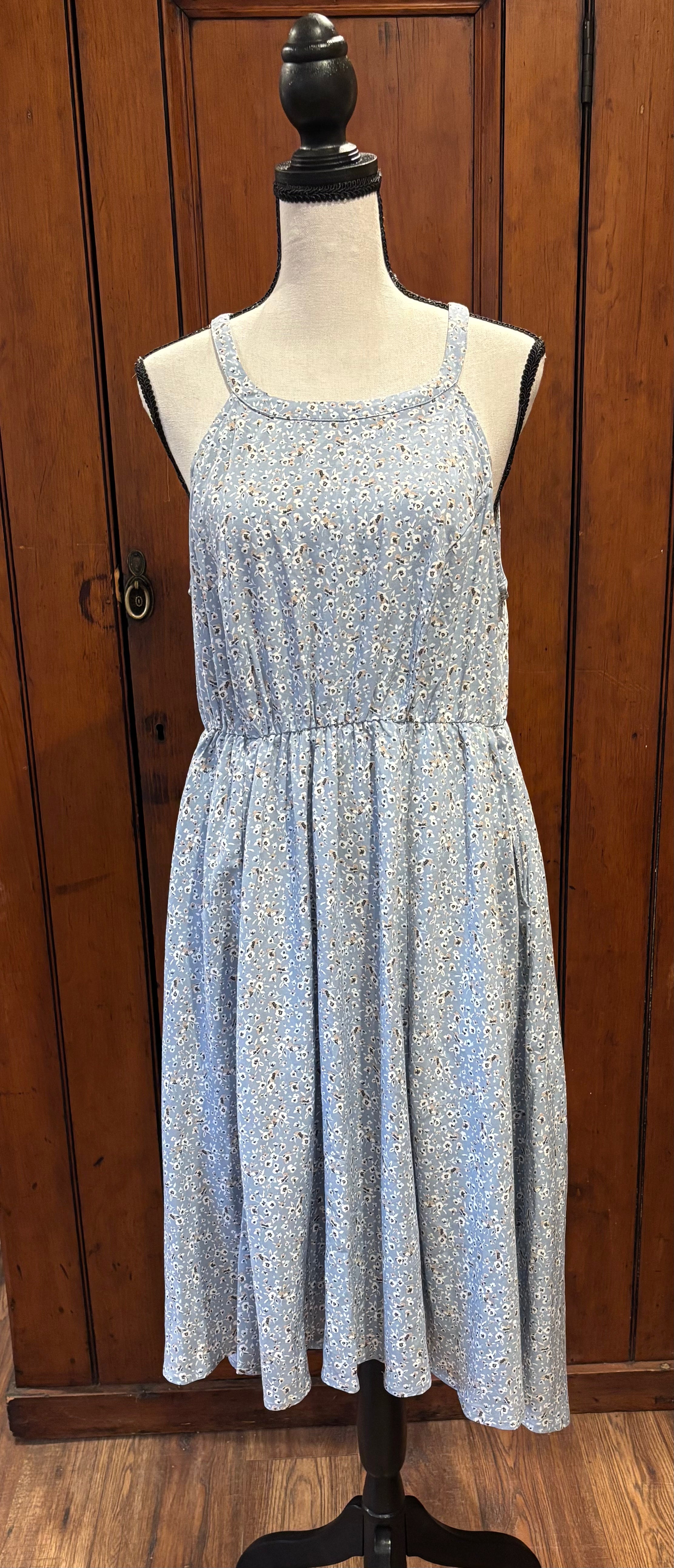 Torrid blue floral midi dress front view pleats accented waist pockets thrifted dresses Sassy and Chic