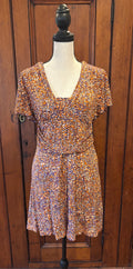 Nanette Lepore multicolor print mini dress front view V-neckline short sleeves pre-owned designer dresses Sassy and Chic
