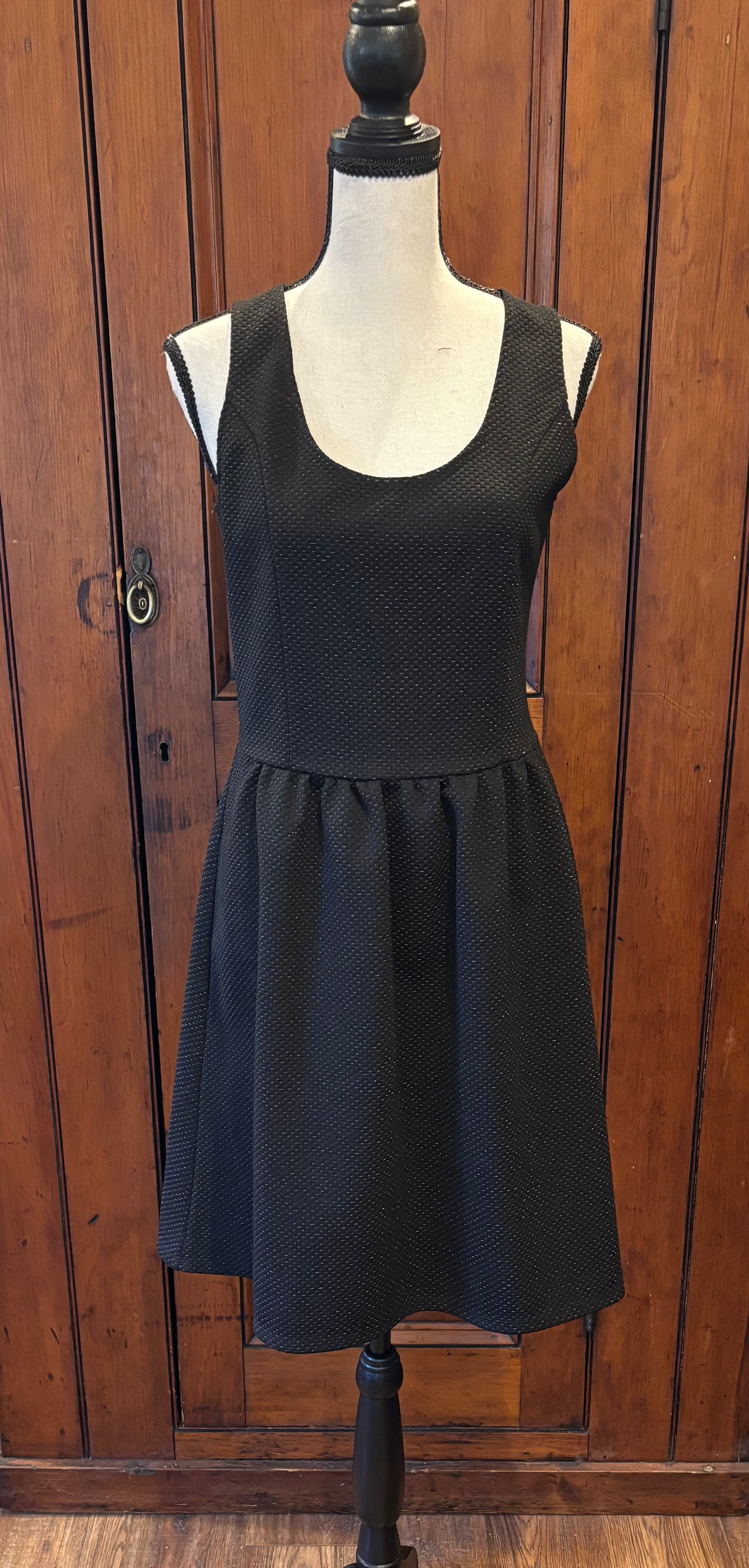 HD in Paris black sleeveless dress front view defined waist pleats pre-loved dresses Sassy and Chic