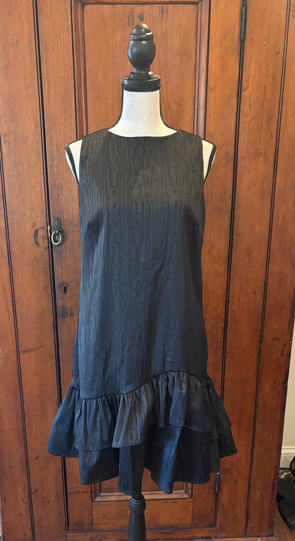 Trina Turk black sleeveless dress front view knee length silhouette pre-owned cocktail dresses Sassy and Chic