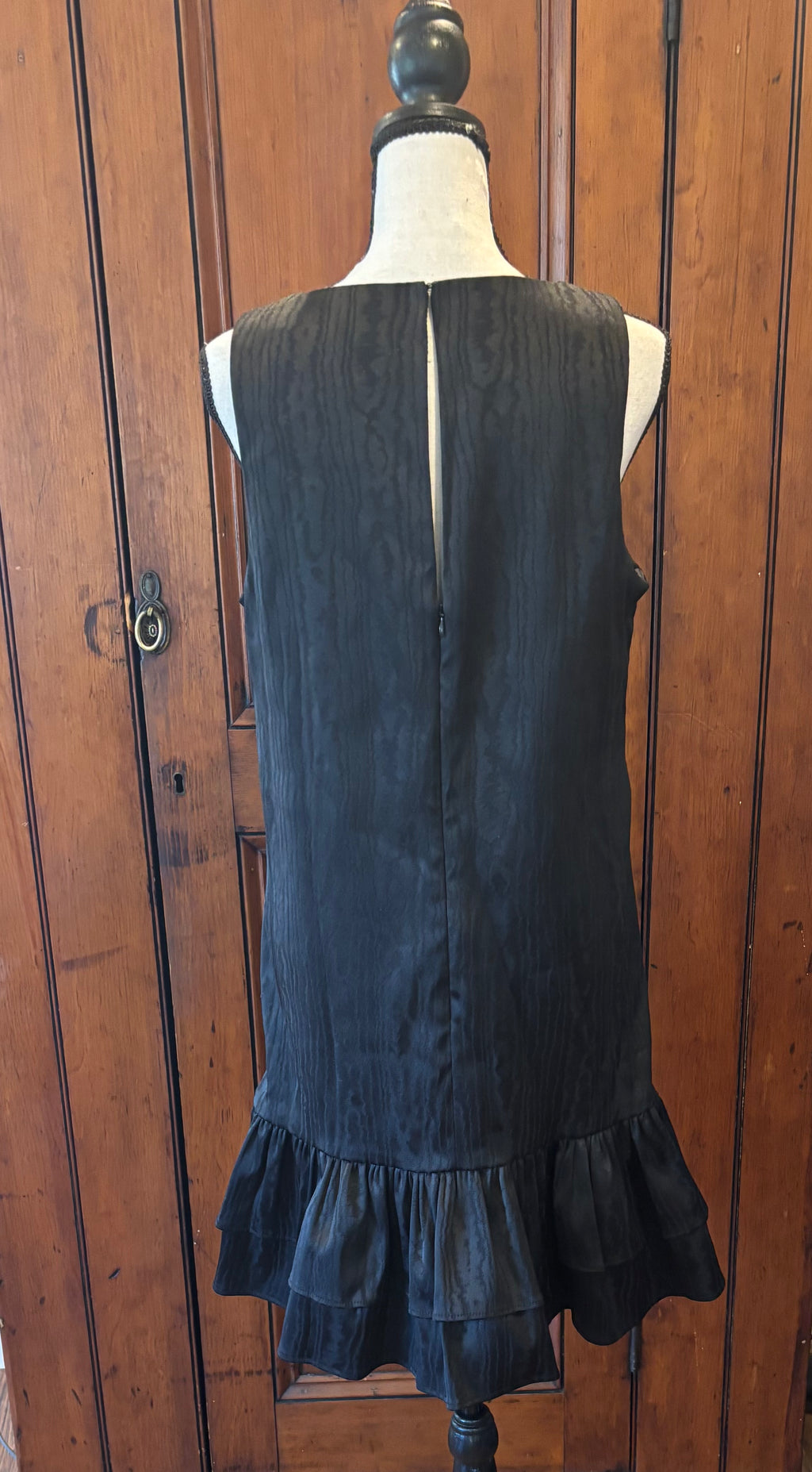 Trina Turk black sleeveless dress back view pre-owned designer cocktail dresses like new Sassy and Chic