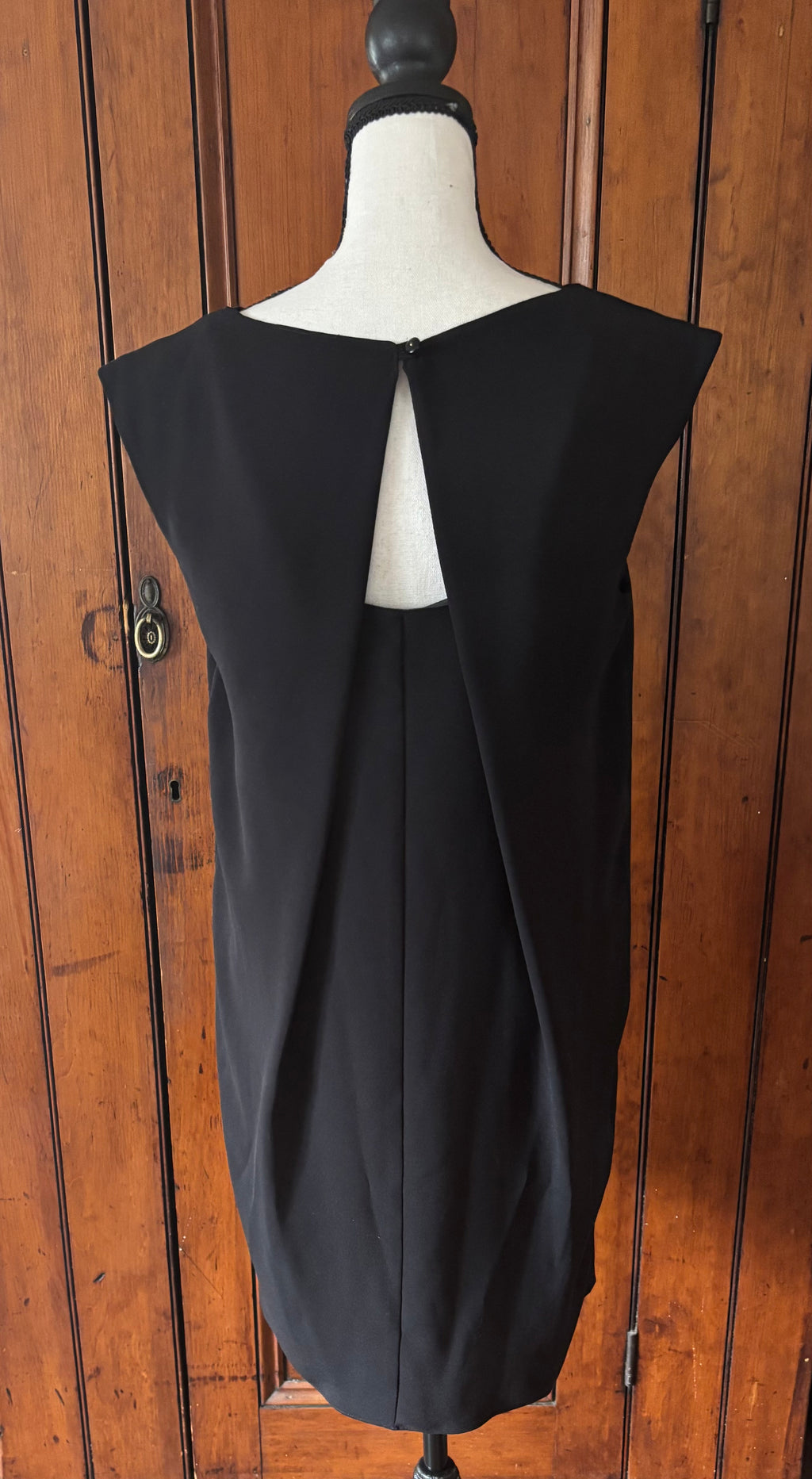 Trina Turk black cap sleeve dress back view gorgeous back detail thrifted designer cocktail dresses Sassy and Chic