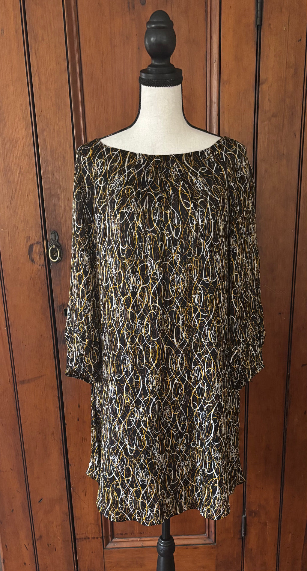 DVF black brown white print silk dress front view long sleeve silhouette thrifted designer dresses Sassy and Chic