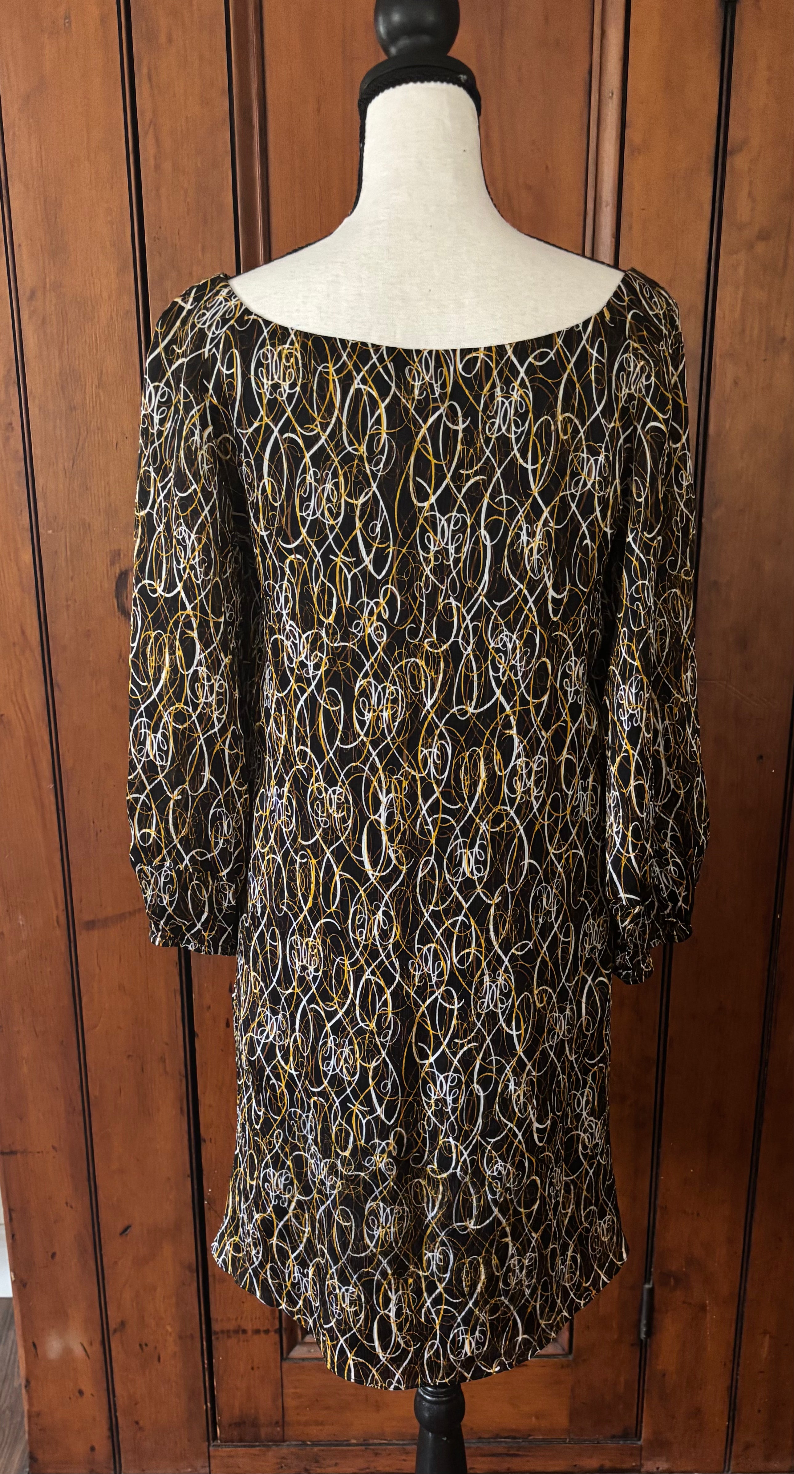 DVF black brown white print silk dress back view thrifted designer dresses like new Sassy and Chic