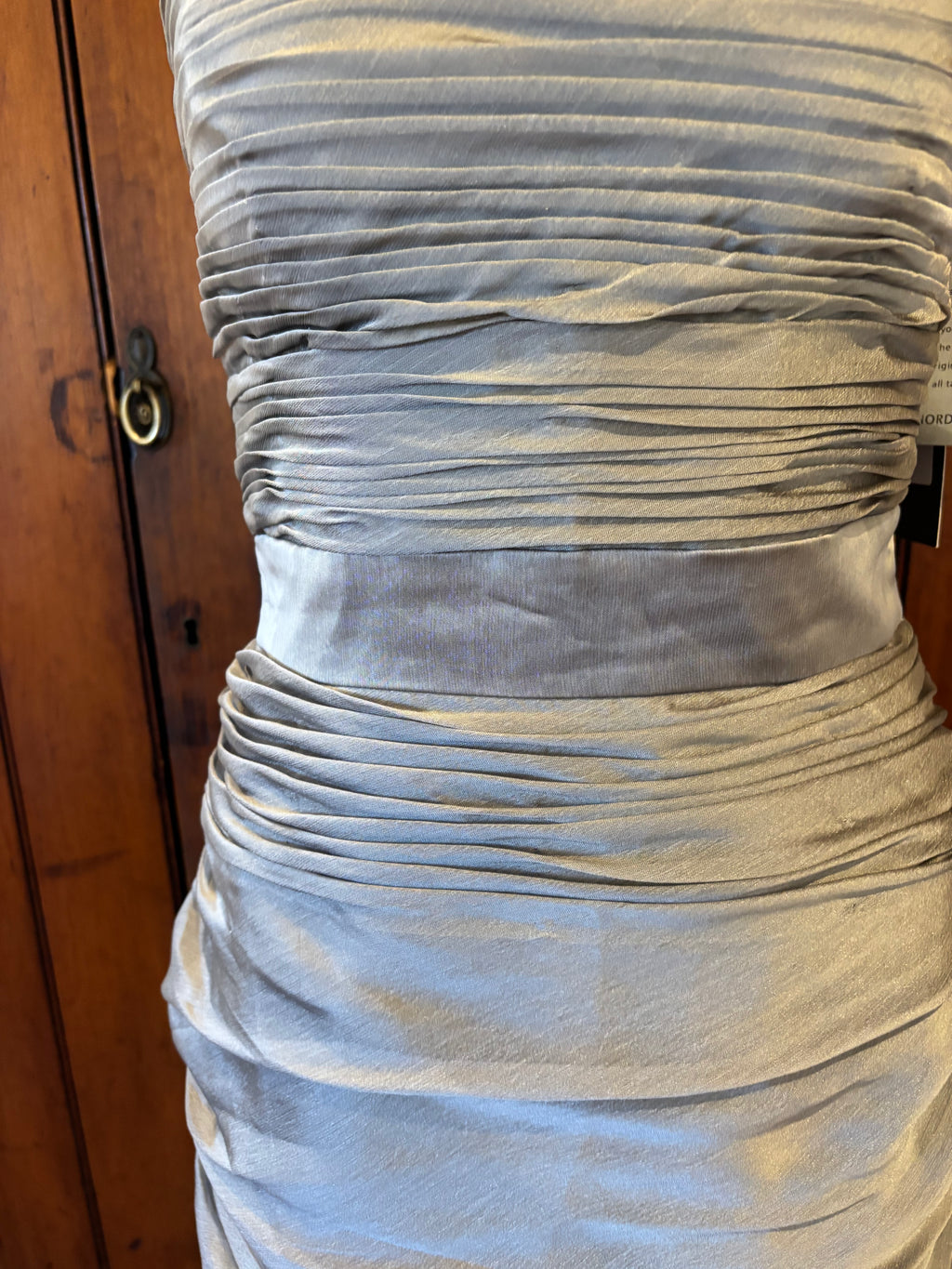 ML Monique Lhuillier silver strapless dress detail close up luminous silver hue rich ruching Sassy and Chic