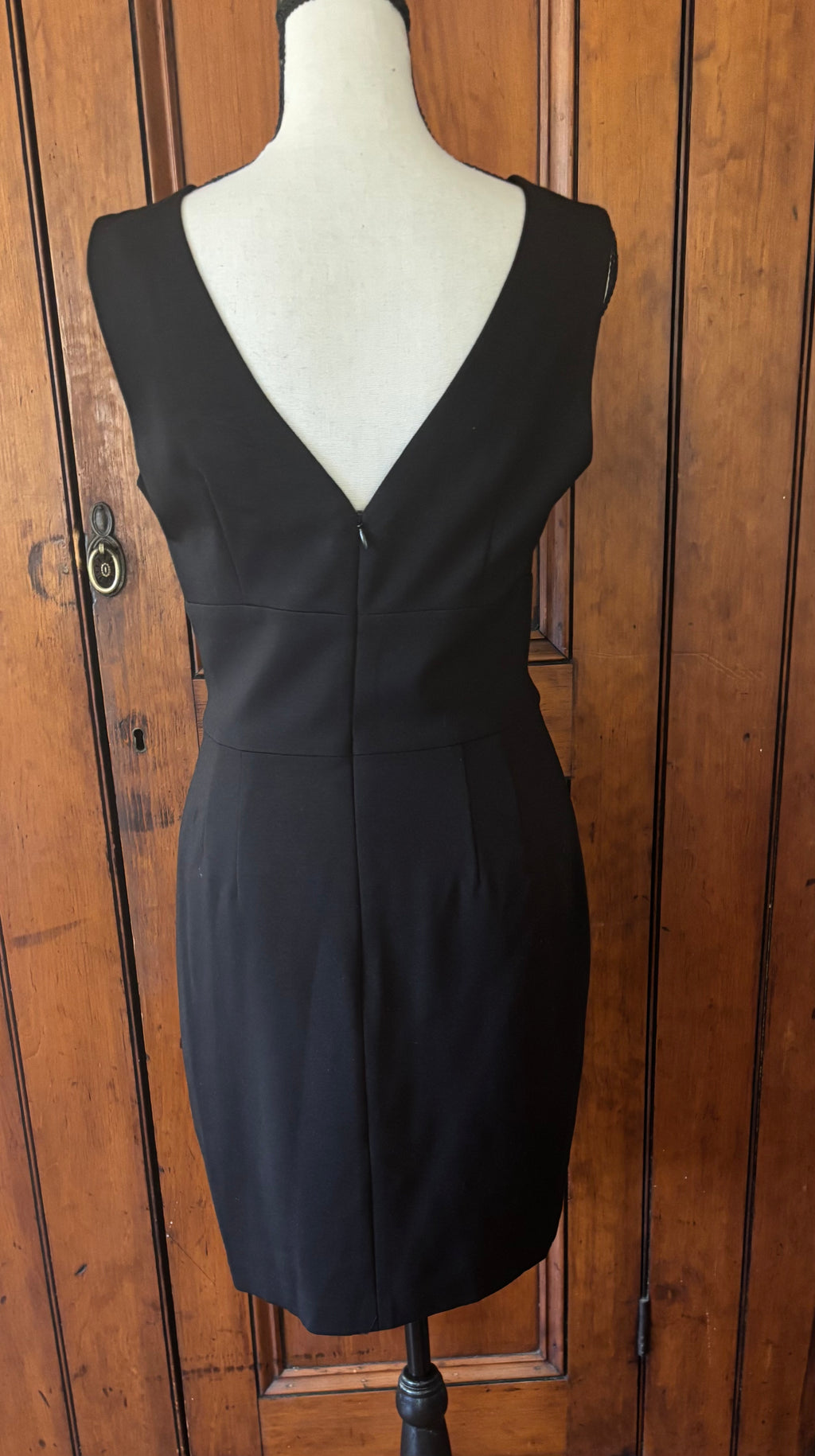 Trina Turk black sleeveless cocktail dress back view stunning deep V back pre-owned designer cocktail dresses Sassy and Chic