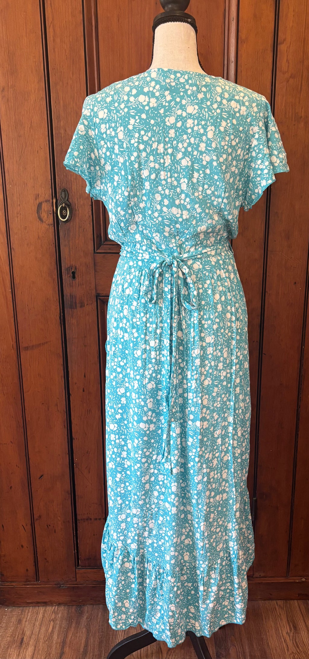Zesica light blue floral boho wrap midi dress back view pre-loved dresses like new Sassy and Chic