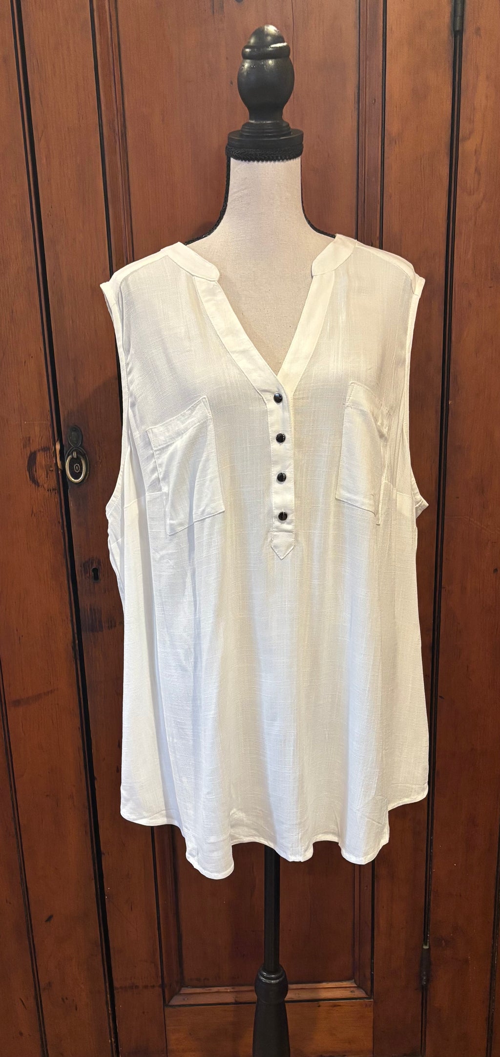 Torrid off white sleeveless button front blouse front view charming buttons thrifted tops and blouses NWTs Sassy and Chic