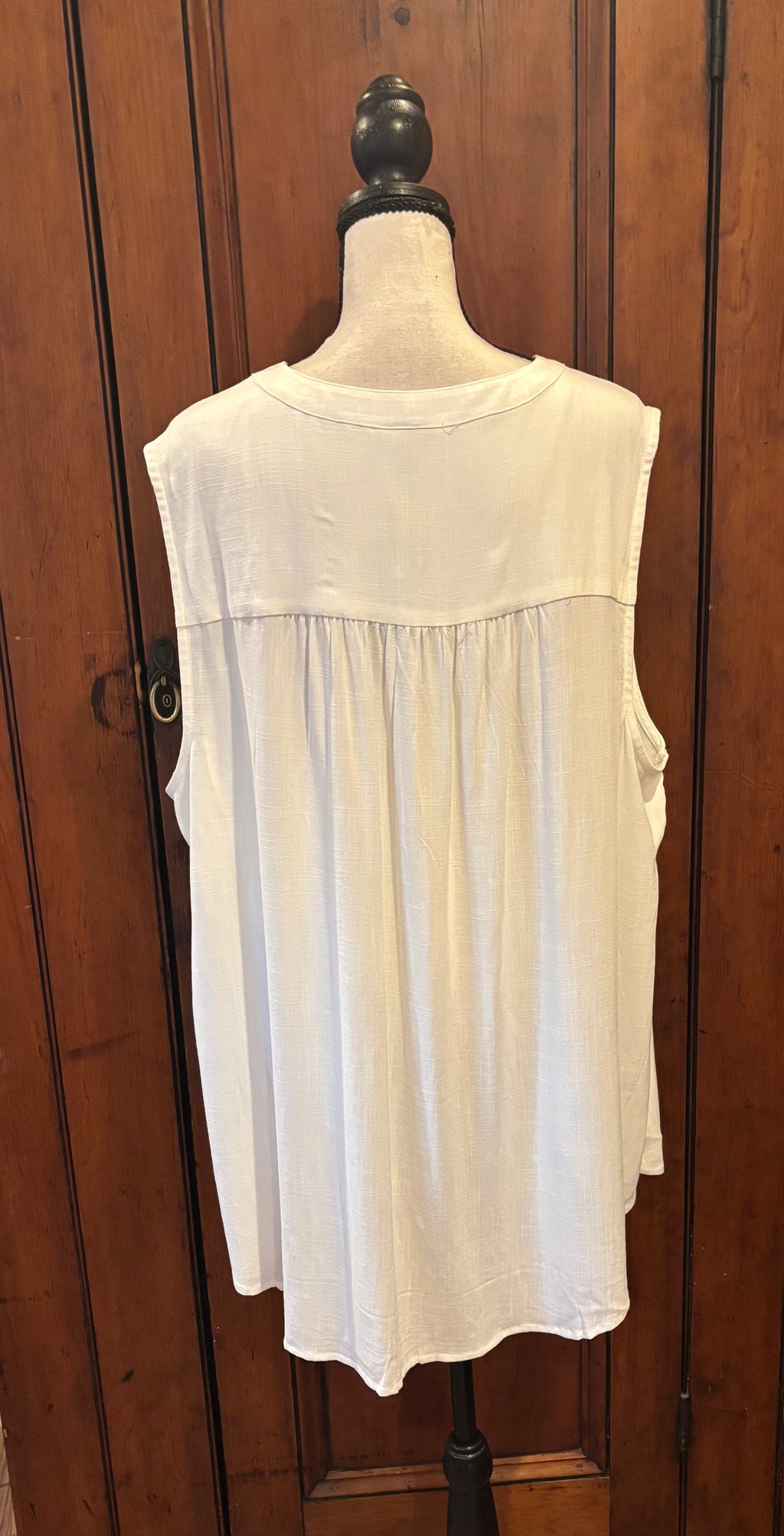 Torrid off white sleeveless button front blouse back view thrifted tops and blouses brand new with tags Sassy and Chic
