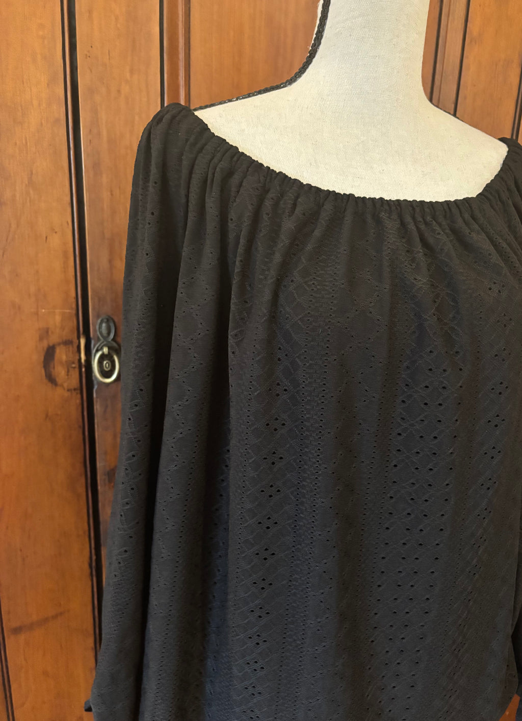 Vince Camuto black boat neck top detail close up neckline long sleeve pre-owned tops and blouses Sassy and Chic