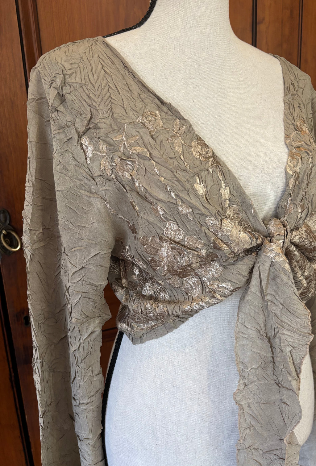 Pre-loved kimonos and sweaters. Komarov kimono sweater detail fabric close up 100% polyester artful drape Sassy and Chic