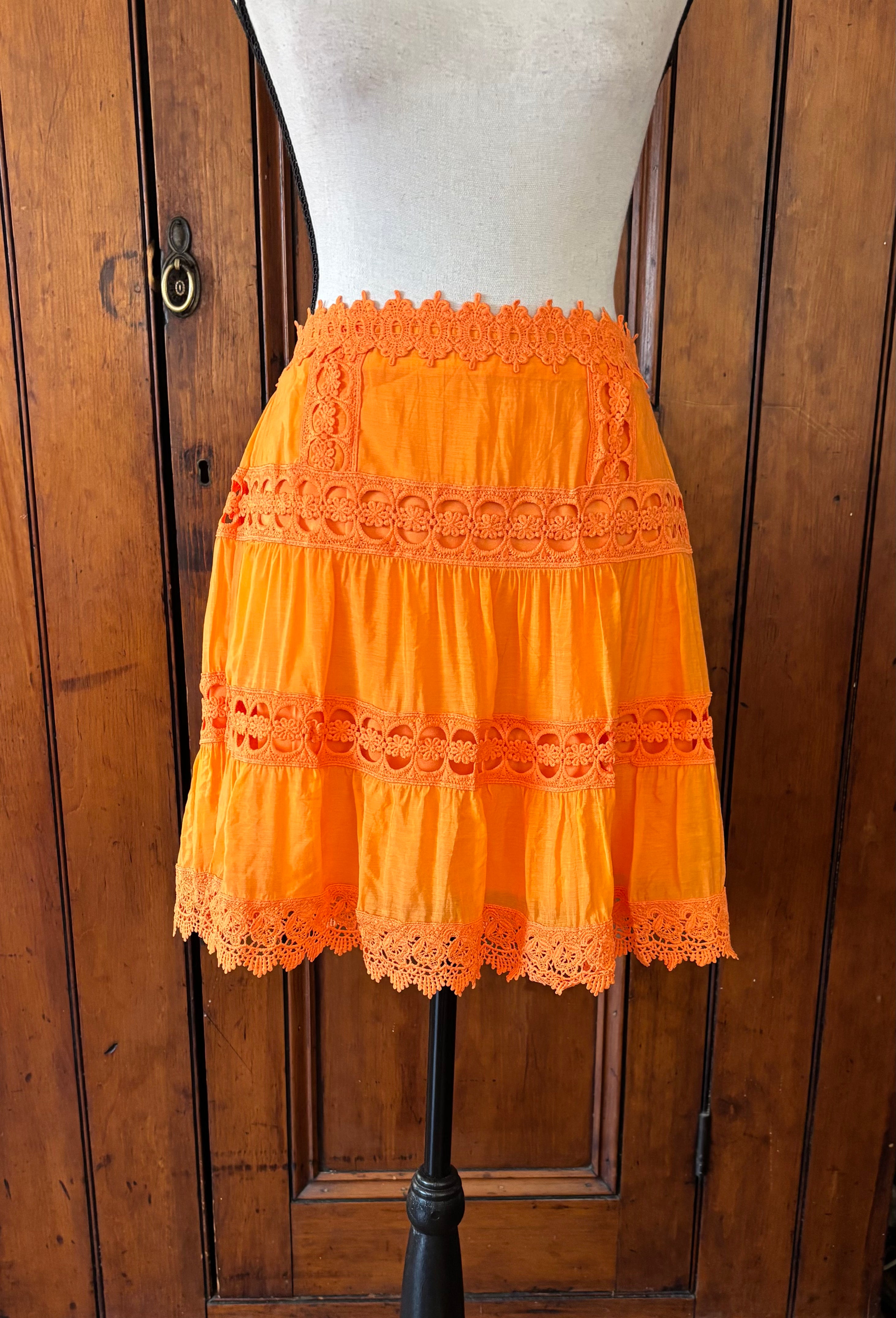 Etiquette crochet  trim mini skirt front view flirty silhouette like new Sassy and Chic
