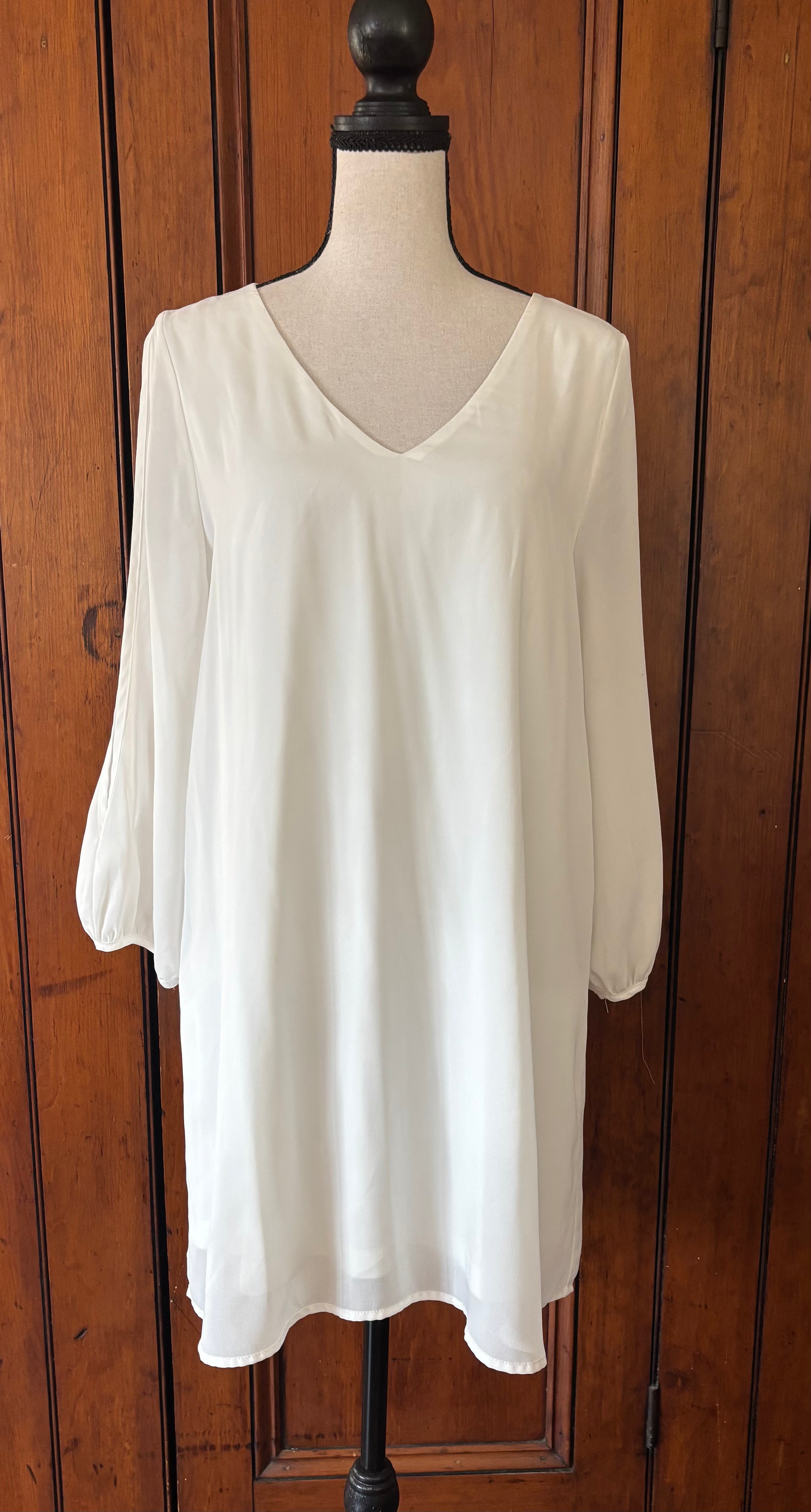 Lulus white long sleeve V-neck mini dress front view flattering V-neckline pre-loved dresses Sassy and Chic