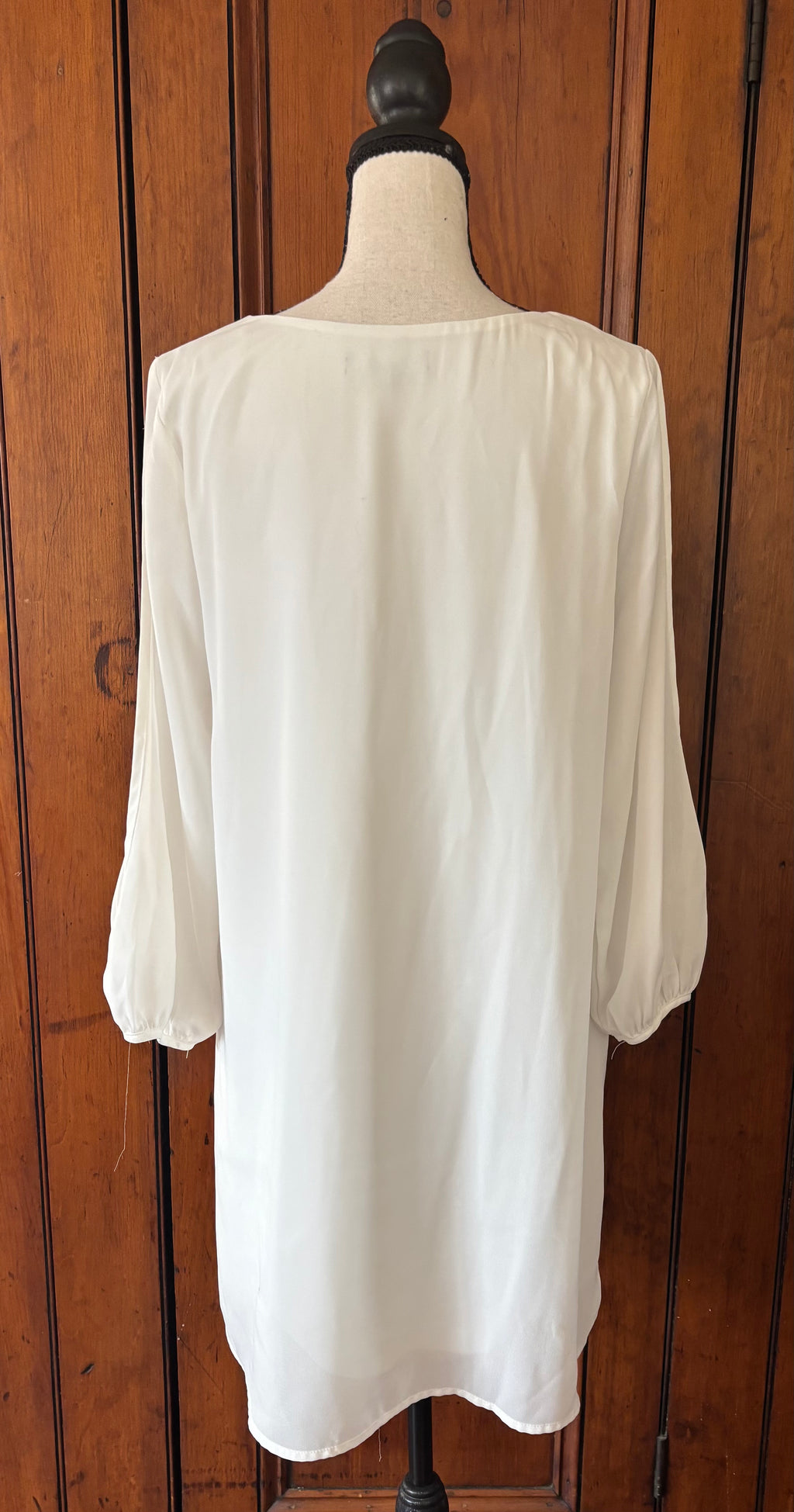 Lulus white long sleeve V-neck mini dress back view tiny spot as shown pre-loved dresses Sassy and Chic