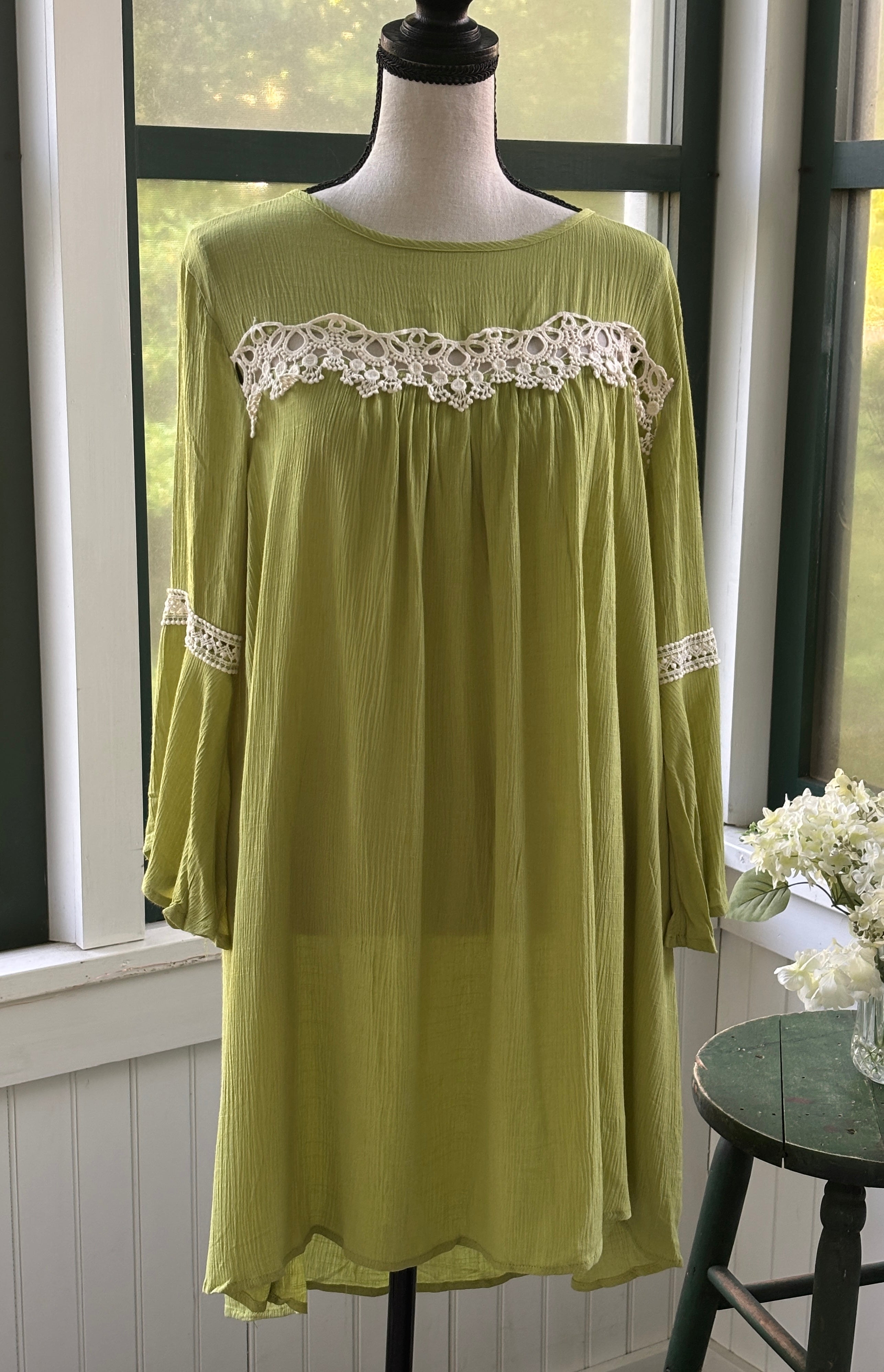 Hayden Los Angeles chartreuse green crochet lace dress with bell sleeves, size small, front view on mannequin