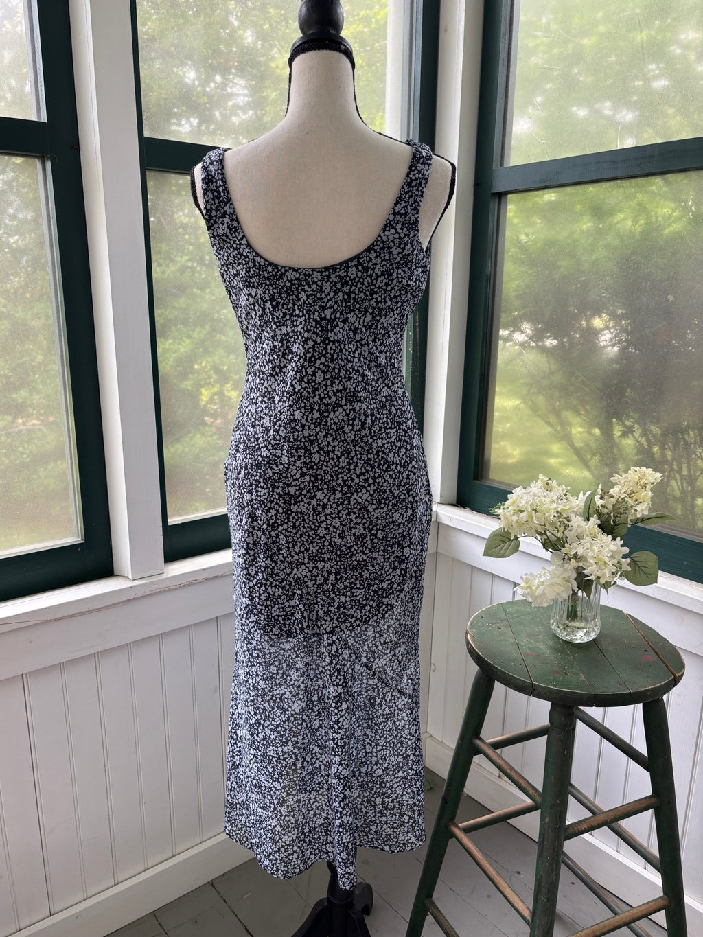 Abercrombie & Fitch navy floral midi dress, back view showing low scoop and fluid skirt