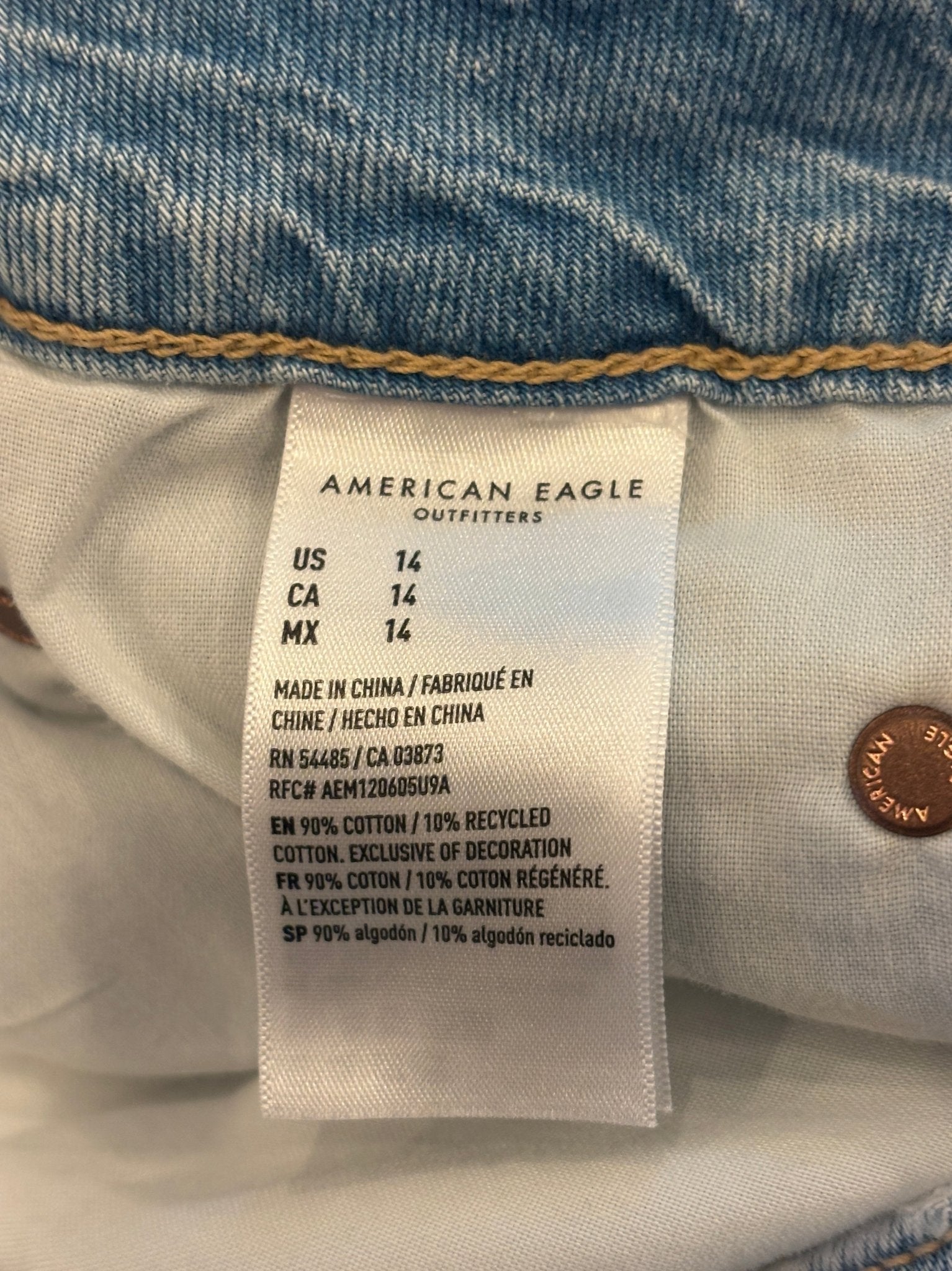 American Eagle branded waistband detail on light wash denim maxi skirt