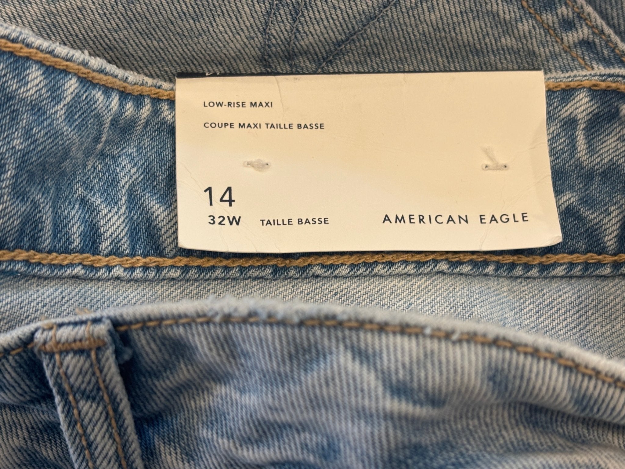 Interior waistband tag showing American Eagle size 14 / 32W low-rise maxi