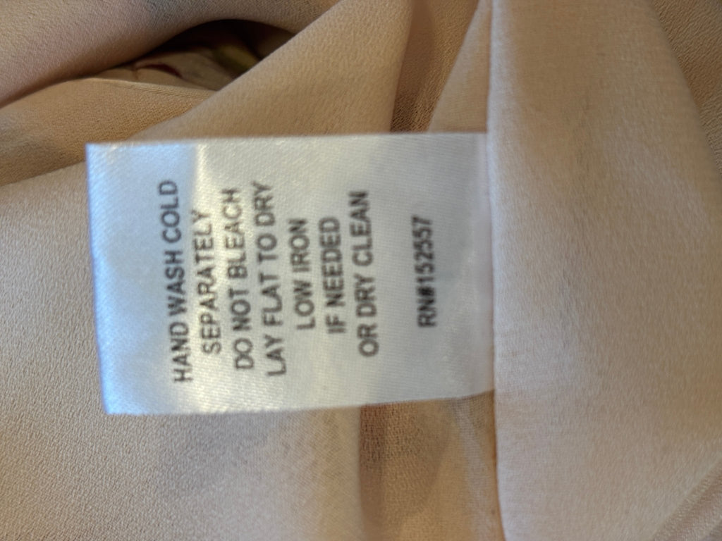 Bailey Rose floral mini skirt size large care label hand wash cold lay flat to dry