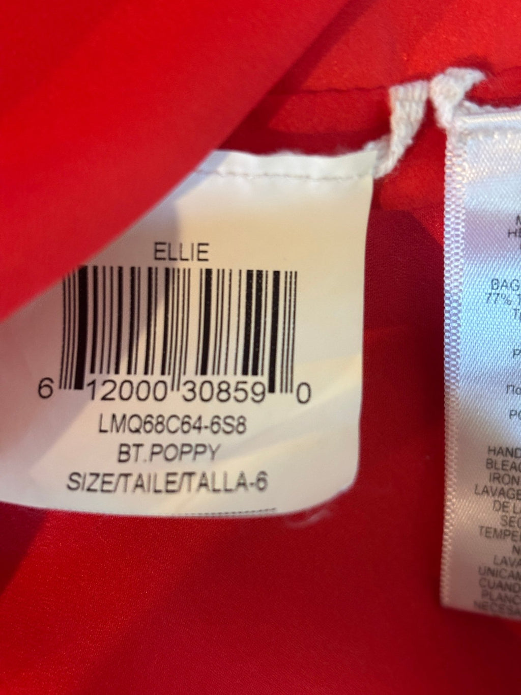 Interior label showing style name Ellie, colorway BT. Poppy, size 6