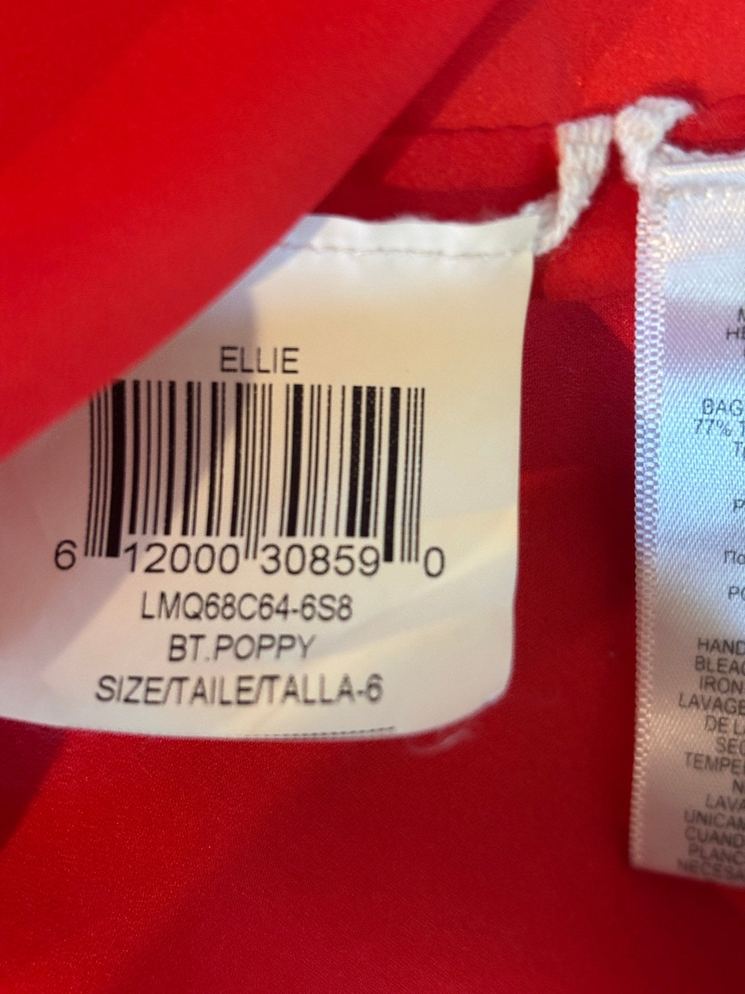 Interior label showing style name Ellie, colorway BT. Poppy, size 6