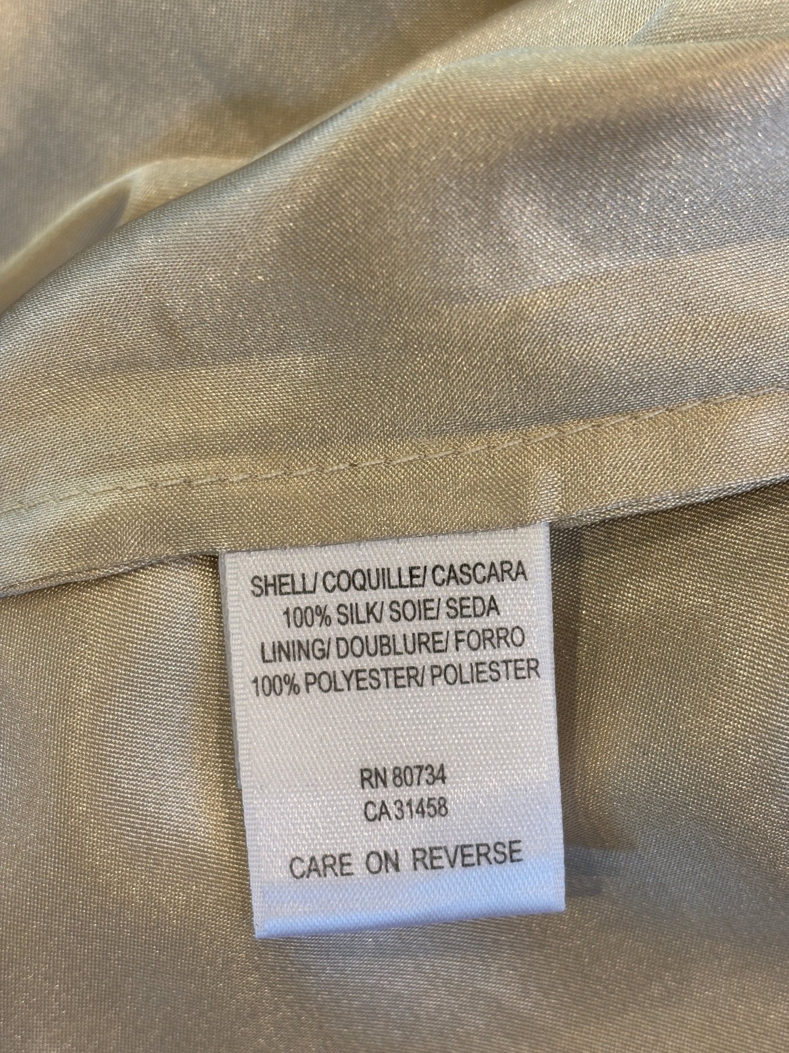 Interior fabric label — 100% silk shell, 100% polyester lining, BCBG Max Azria