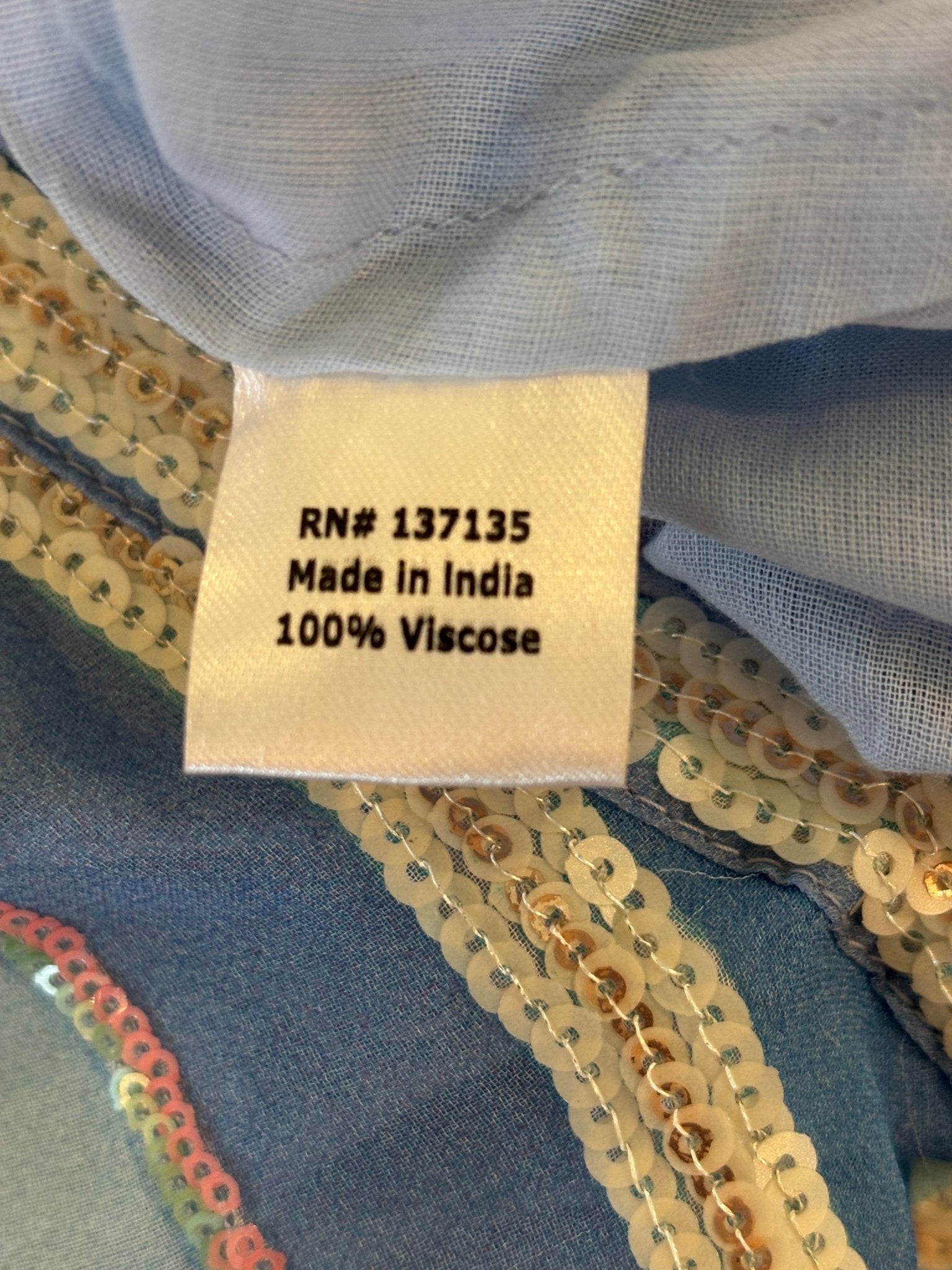 Fabric content label showing 100% viscose, made in India