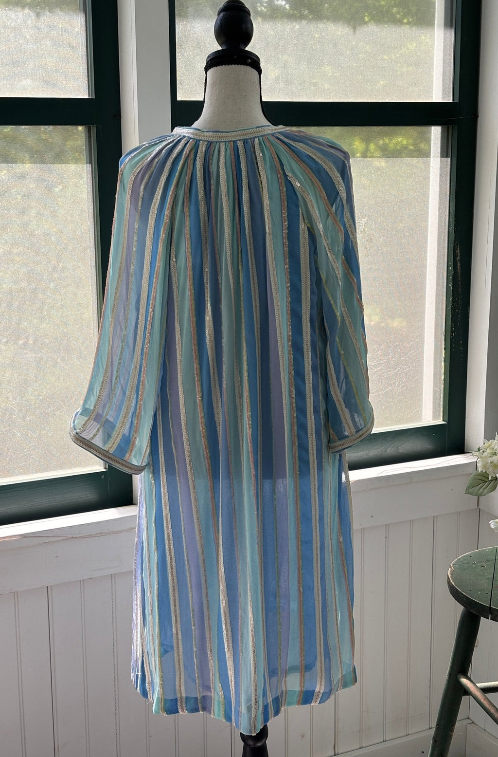 Bella Tu Petra tunic dress back view showing gathered yoke and flowing sequin stripe silhouette