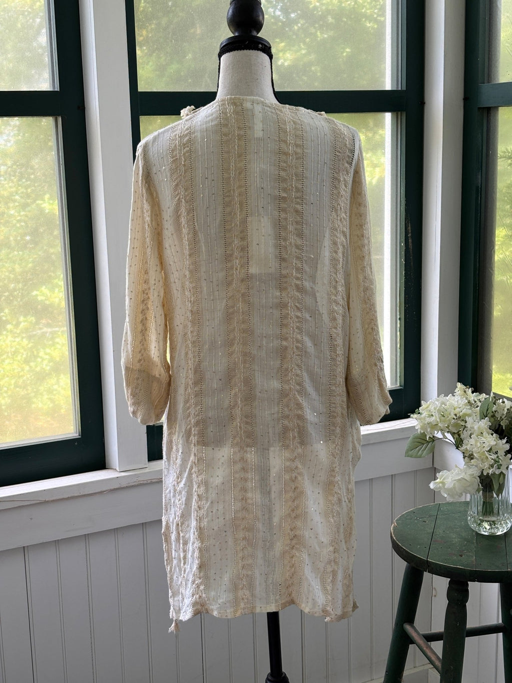 Back view of Buby.S Dreamy Woven Tunic showing three-quarter sleeves and open weave texture in ivory cream