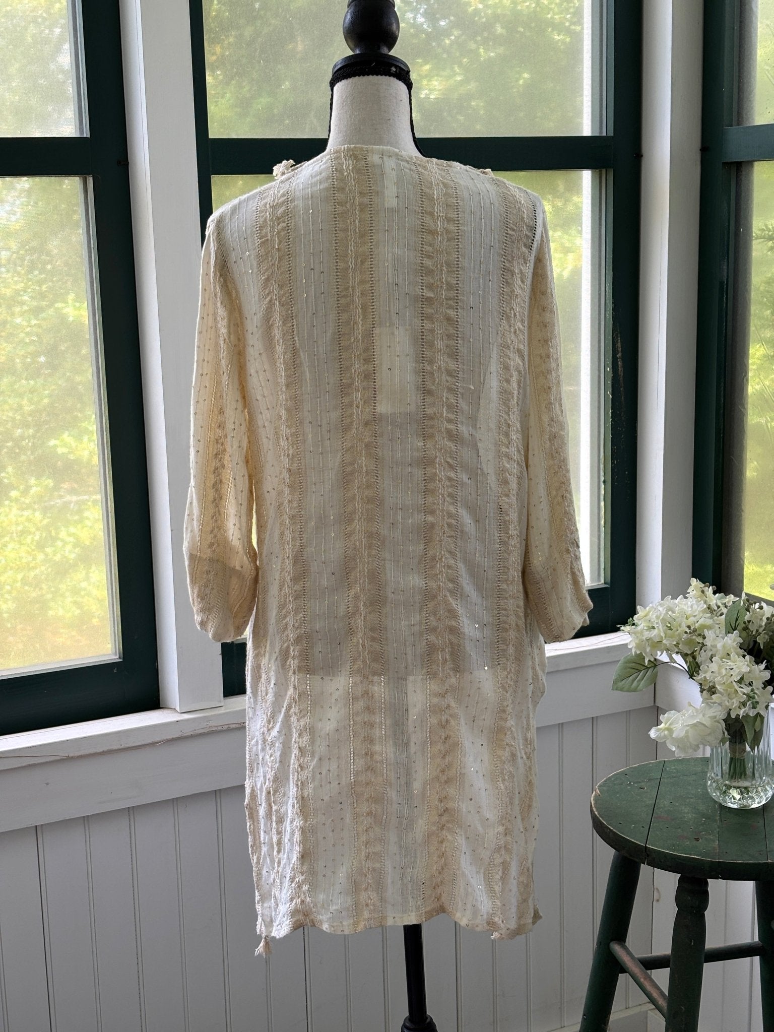 Back view of Buby.S Dreamy Woven Tunic showing three-quarter sleeves and open weave texture in ivory cream