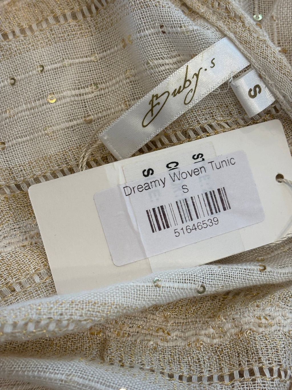 Interior brand label showing Buby.S name and size Small