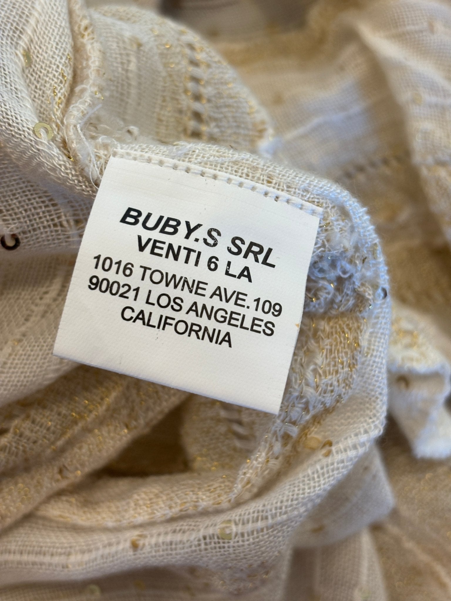 Interior label showing Buby.S SRL brand information and Los Angeles address