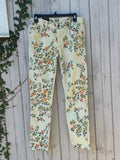Front view of Citizens of Humanity Thompson skinny jeans in Petite Rose Natural floral print on hanger — cream base with terra cotta, blush, mustard, and sage roses