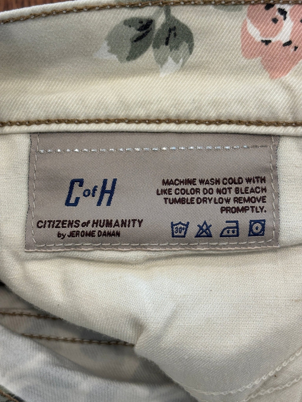 Interior waistband label showing Citizens of Humanity by Jerome Dahan, care instructions, machine wash cold