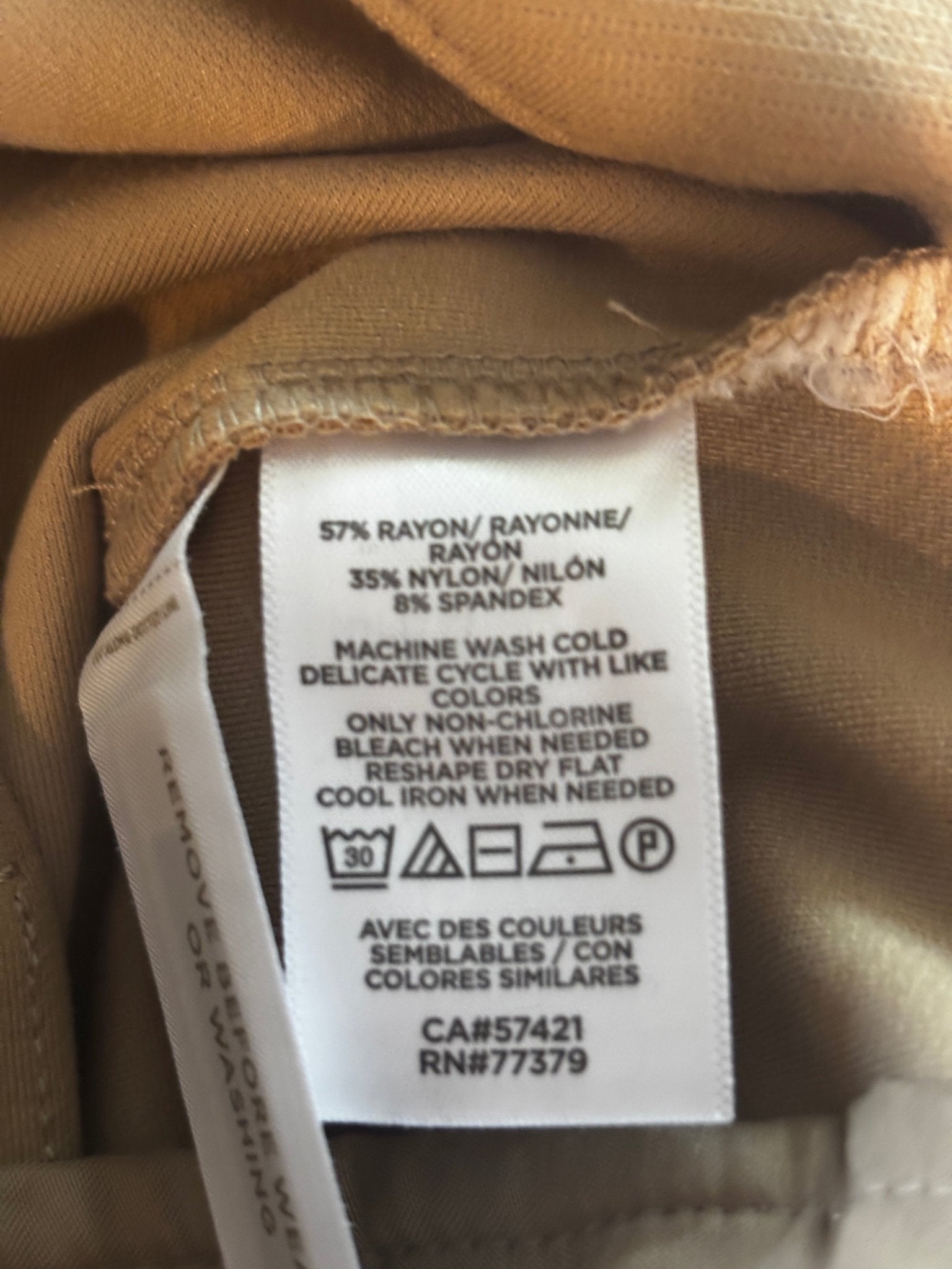 Ann Taylor thrifted  pants fabric label 57% rayon 35% nylon 8% spandex care instructions