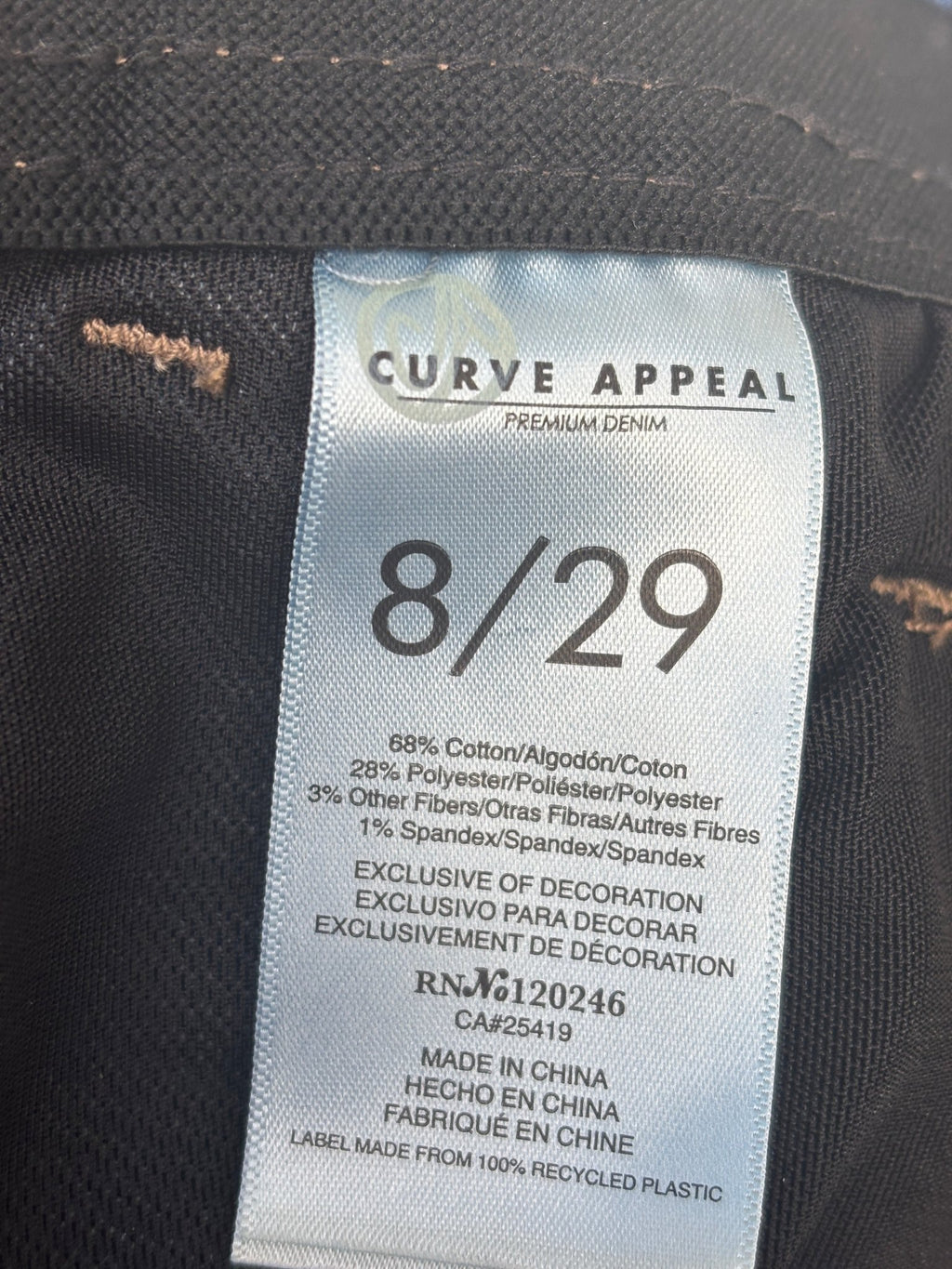 Curve Appeal fabric content label showing size 8/29 and cotton blend
