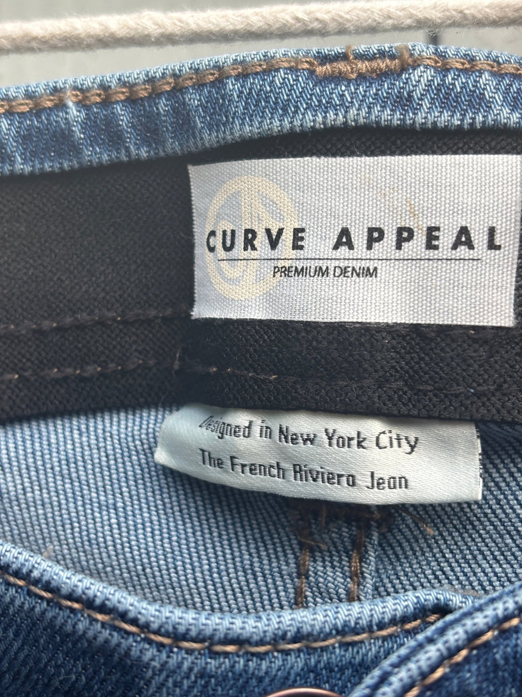 Curve Appeal Premium Denim brand label, designed in New York City