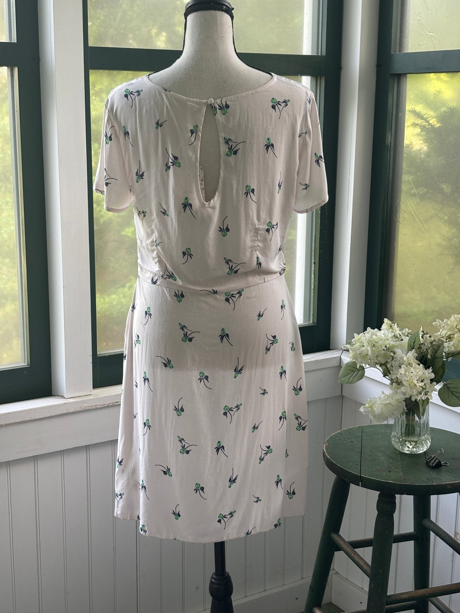 Free People floral mini dress, back view showing keyhole closure