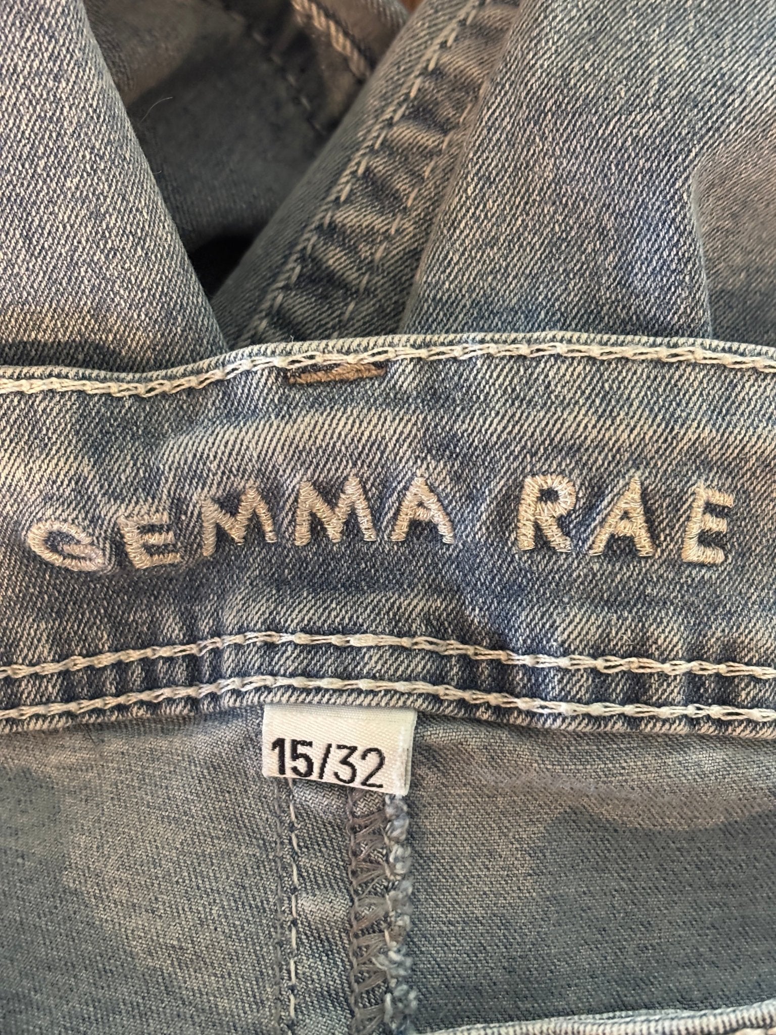 Interior waistband showing embroidered Gemma Rae brand name and size 15/32 tag