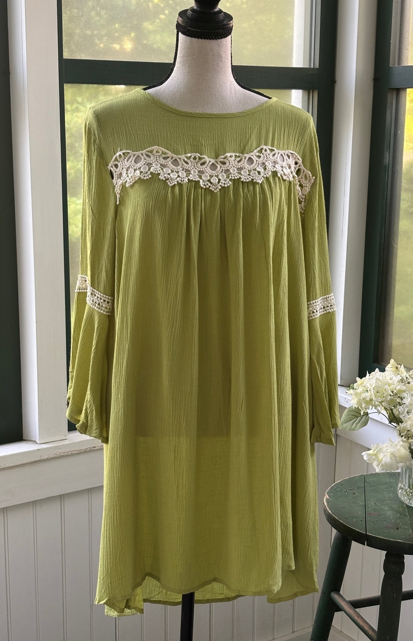 Hayden Los Angeles chartreuse green crochet lace dress with bell sleeves, size small, front view on mannequin