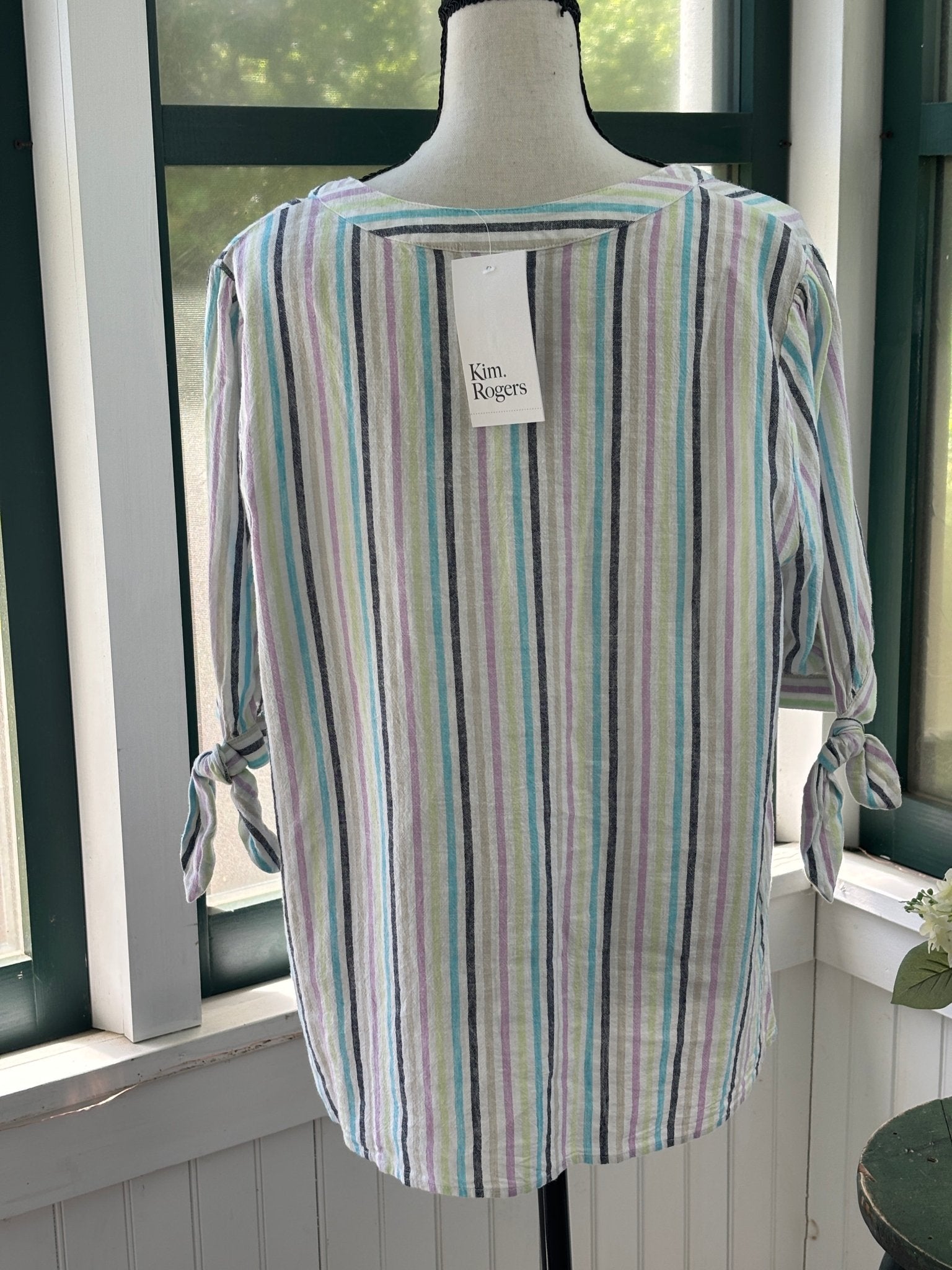 Back view of Kim Rogers stripe tunic showing NWT tag and self-tie knot cuff detail