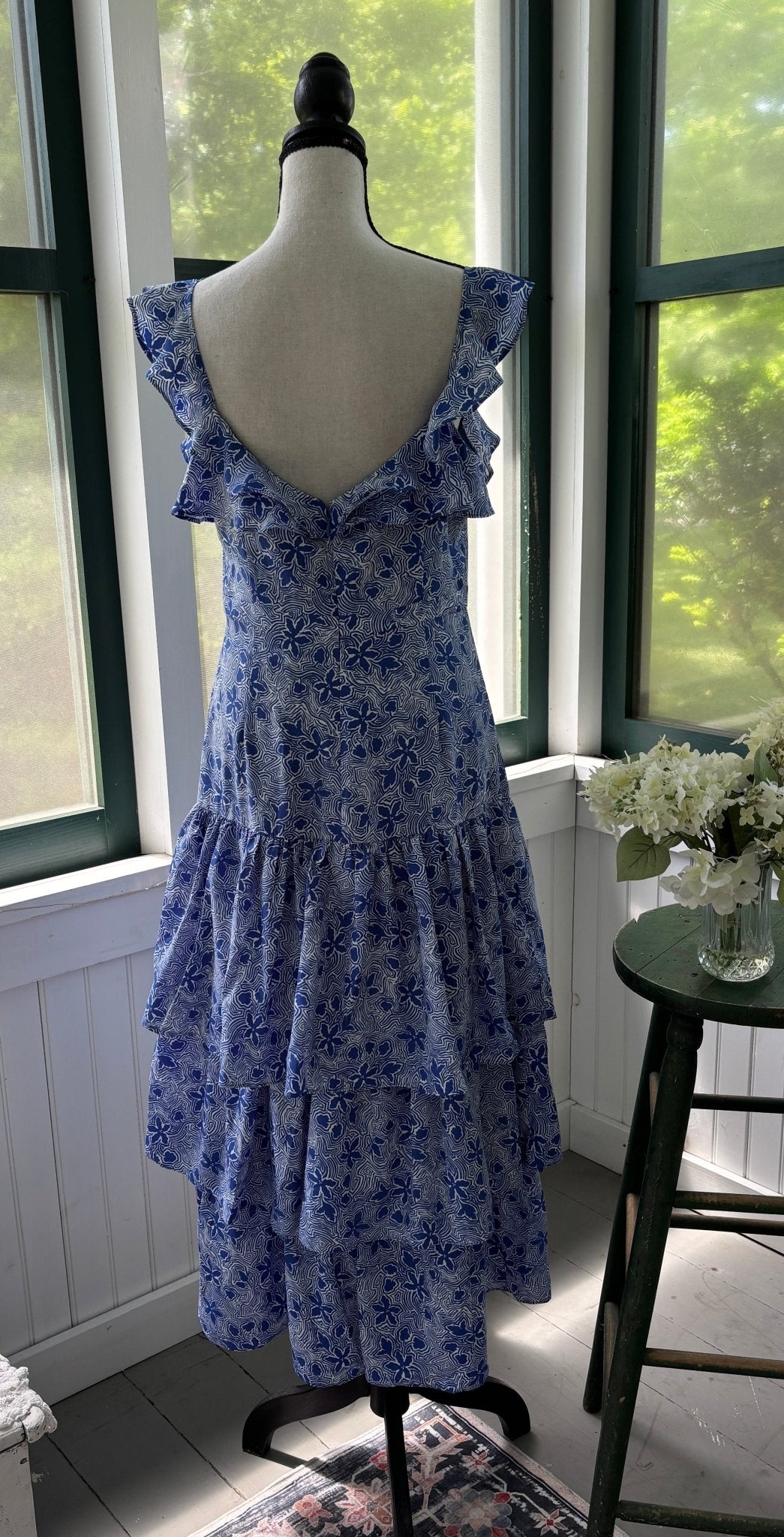 Likely blue floral ruffle midi dress blue white botanical print ruffle back detail size 6 NWT back view