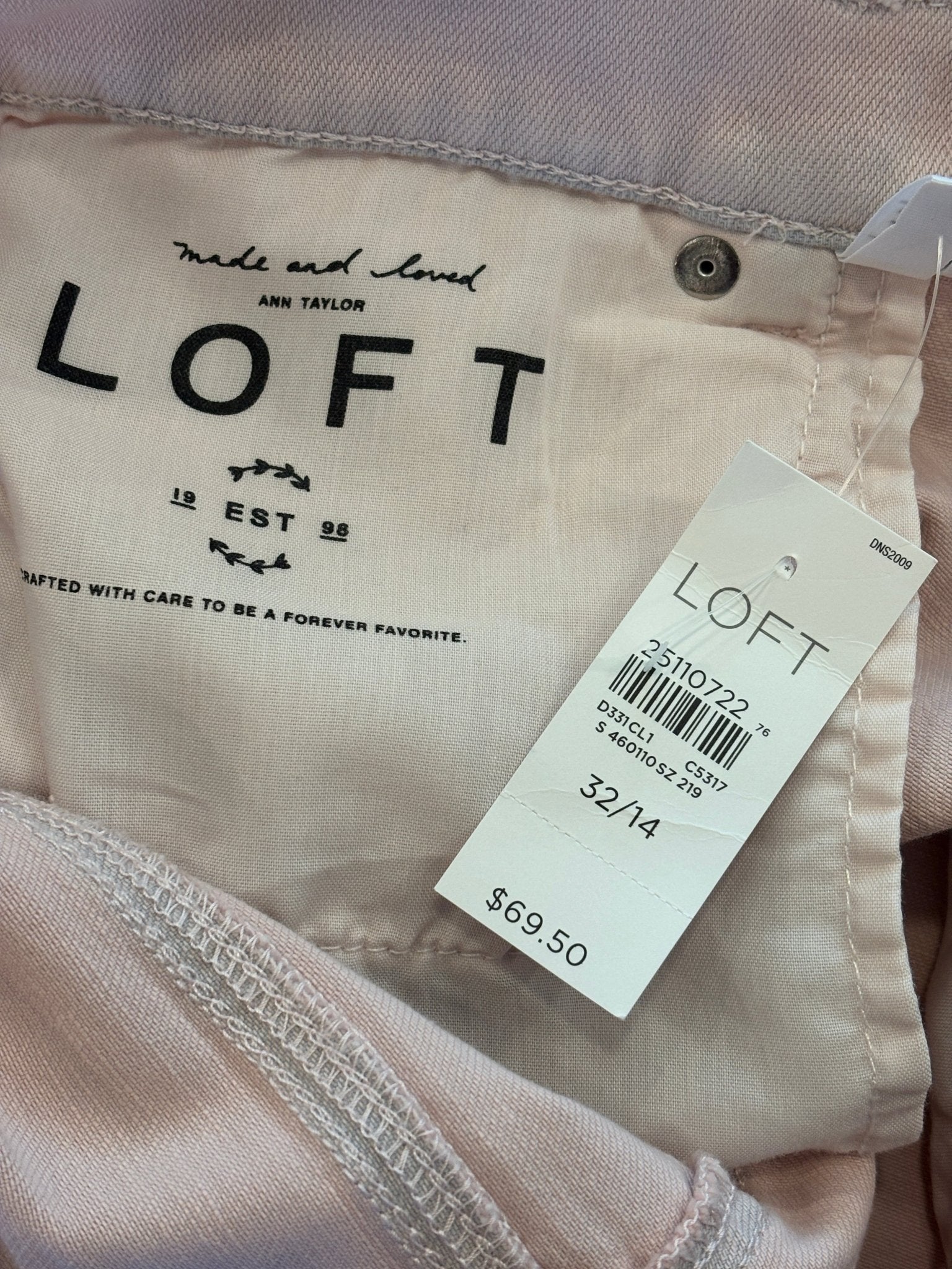 LOFT Ann Taylor interior label and original price tag showing $69.50