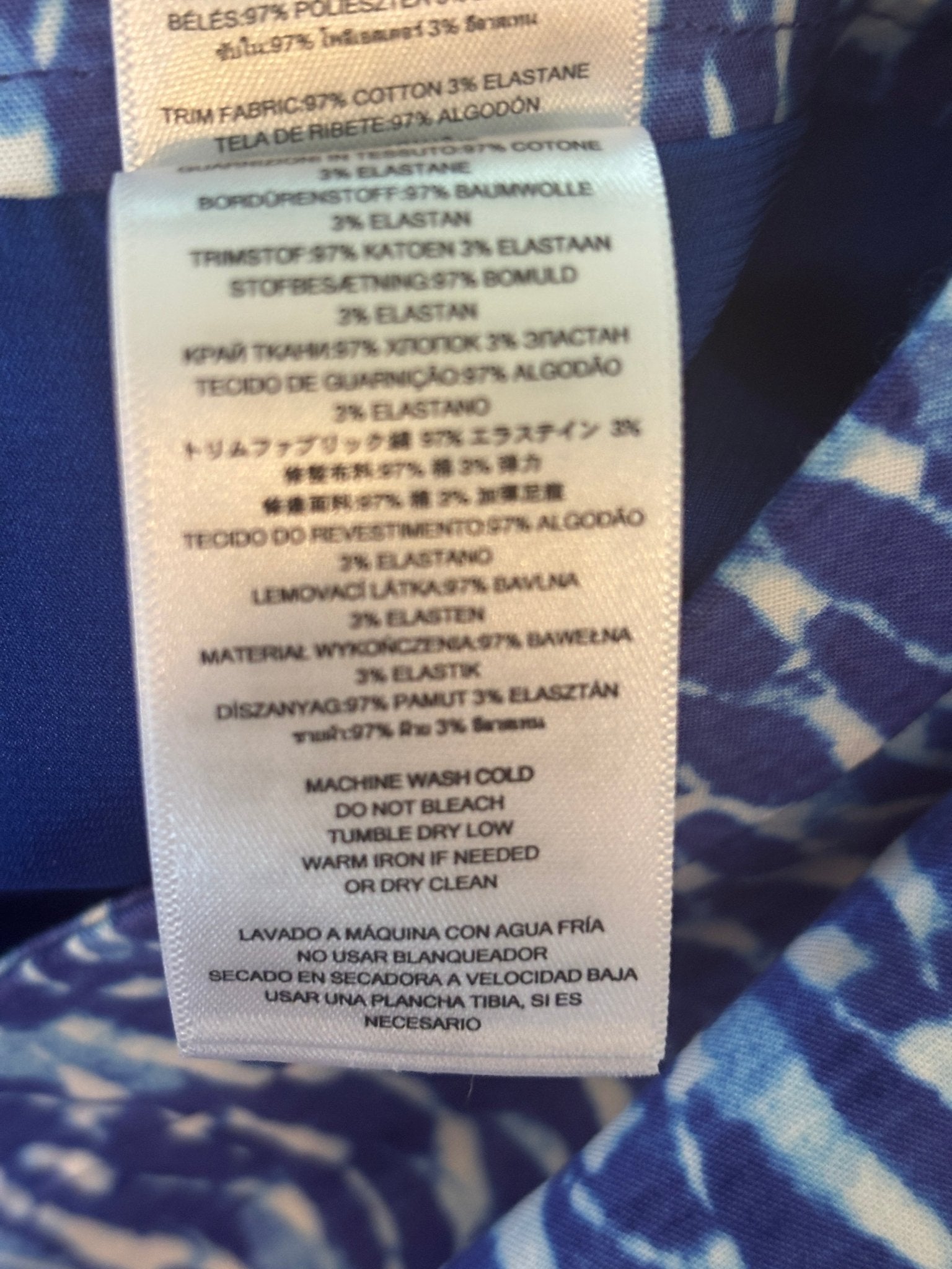 Extended care and fabric content label for Michael Michael Kors mini skirt