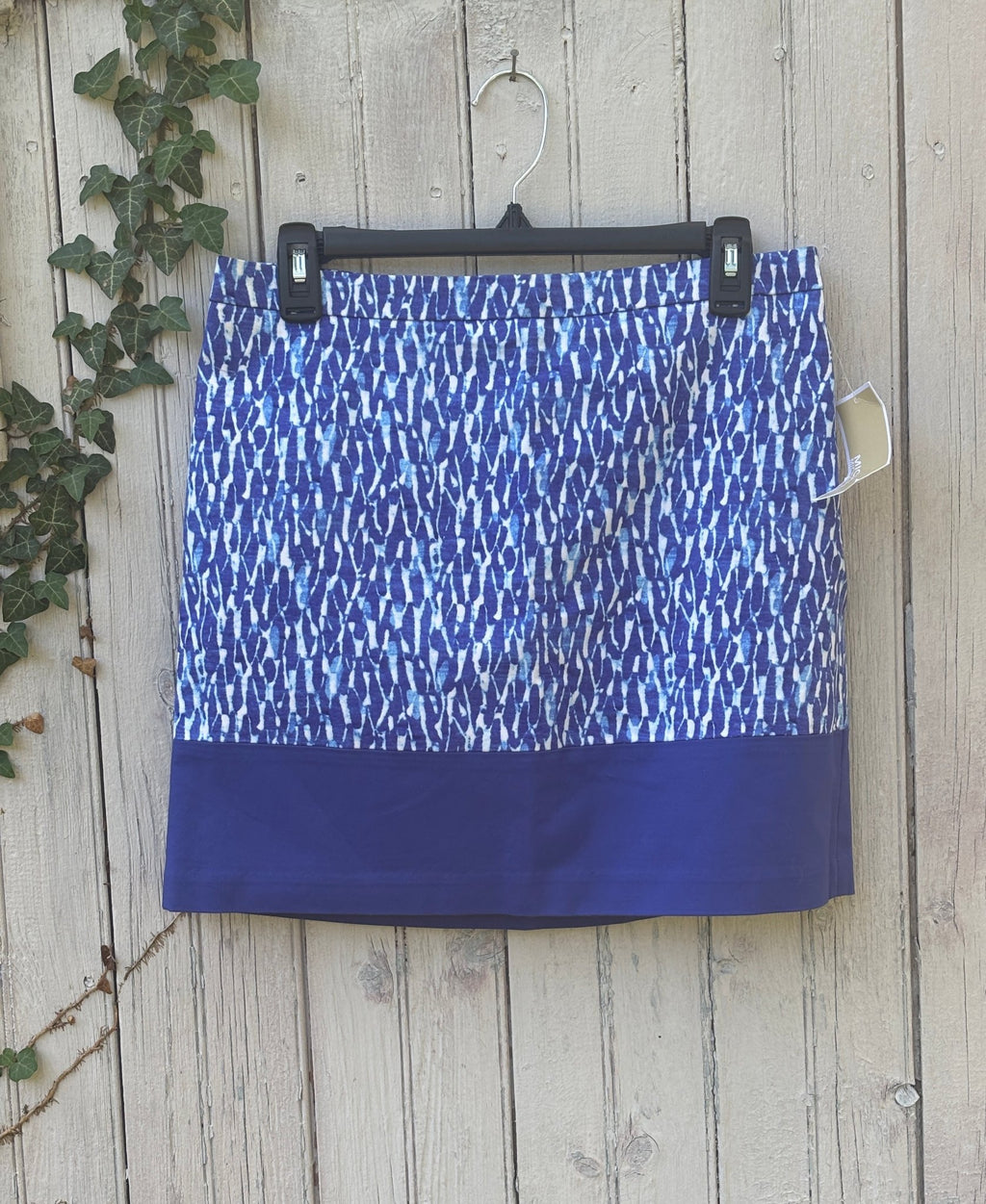 Michael Michael Kors royal blue abstract print mini skirt, front view on hanger