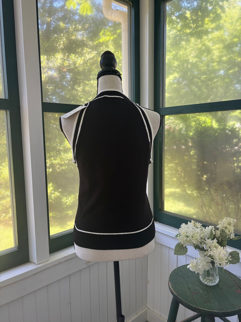 Miholl black knit tank top back view showing white contrast trim, size large